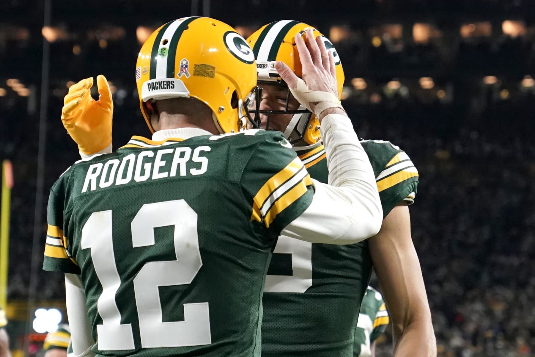 Aaron Rodgers and Christian Watson