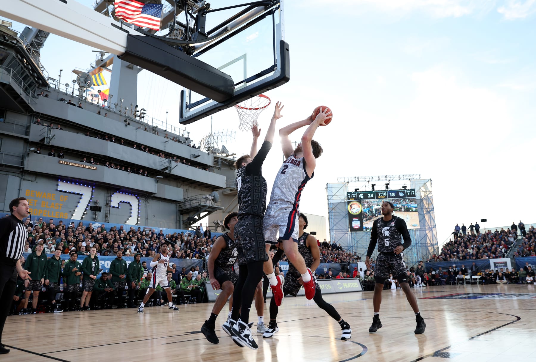 SAN DIEGO, CALIFORNIA - NOVEMBER 11: Drew Timme #2 of the Gonzaga Bulldogs drives to the basket against Jaxon Kohler #0 of the Michigan State Spartans in the first half during the Armed Forces Classic aboard the USS Abraham Lincoln aircraft carrier on November 11, 2022 in San Diego, California. (Photo by Sean M. Haffey/Getty Images)