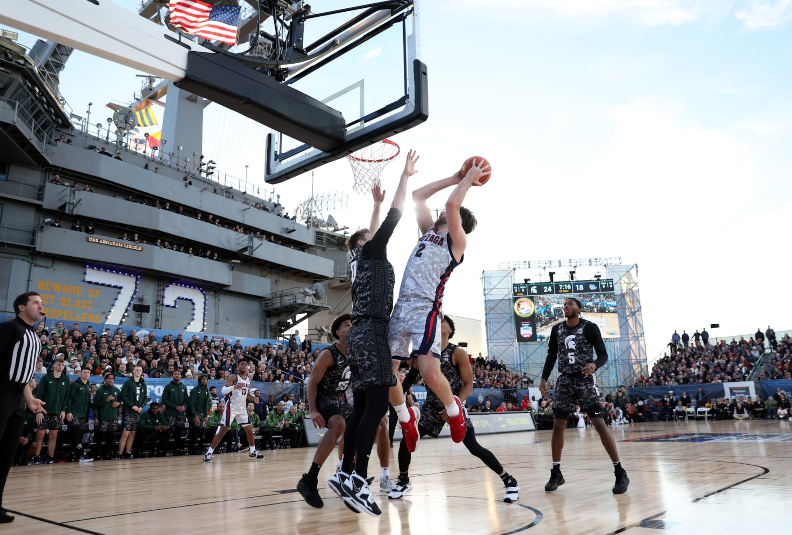 SAN DIEGO, CALIFORNIA - NOVEMBER 11: Drew Timme #2 of the Gonzaga Bulldogs drives to the basket against Jaxon Kohler #0 of the Michigan State Spartans in the first half during the Armed Forces Classic aboard the USS Abraham Lincoln aircraft carrier on November 11, 2022 in San Diego, California. (Photo by Sean M. Haffey/Getty Images)