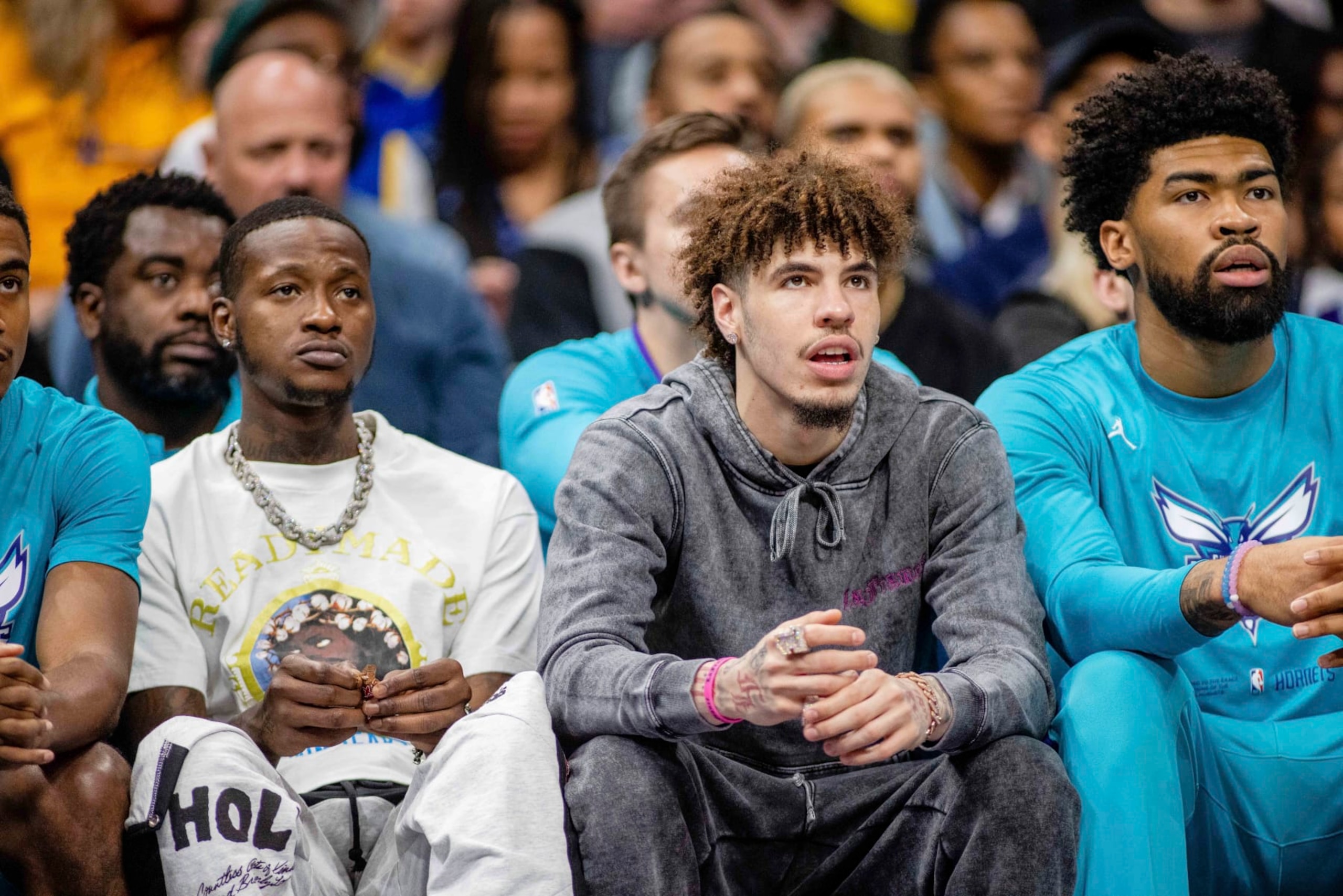 Charlotte Hornets guard Terry Rozier (3) and guard LaMelo Ball (1) watch from the bench during the first half of an NBA basketball game against Golden State Warriors on Saturday, Oct. 29, 2022, in Charlotte, N.C. (AP Photo/Scott Kinser) Charlotte Hornets guard Terry Rozier (3) and guard LaMelo Ball (1) watch from the bench during the first half of an NBA basketball game against Golden State Warriors on Saturday, Oct. 29, 2022, in Charlotte, N.C. (AP Photo/Scott Kinser)