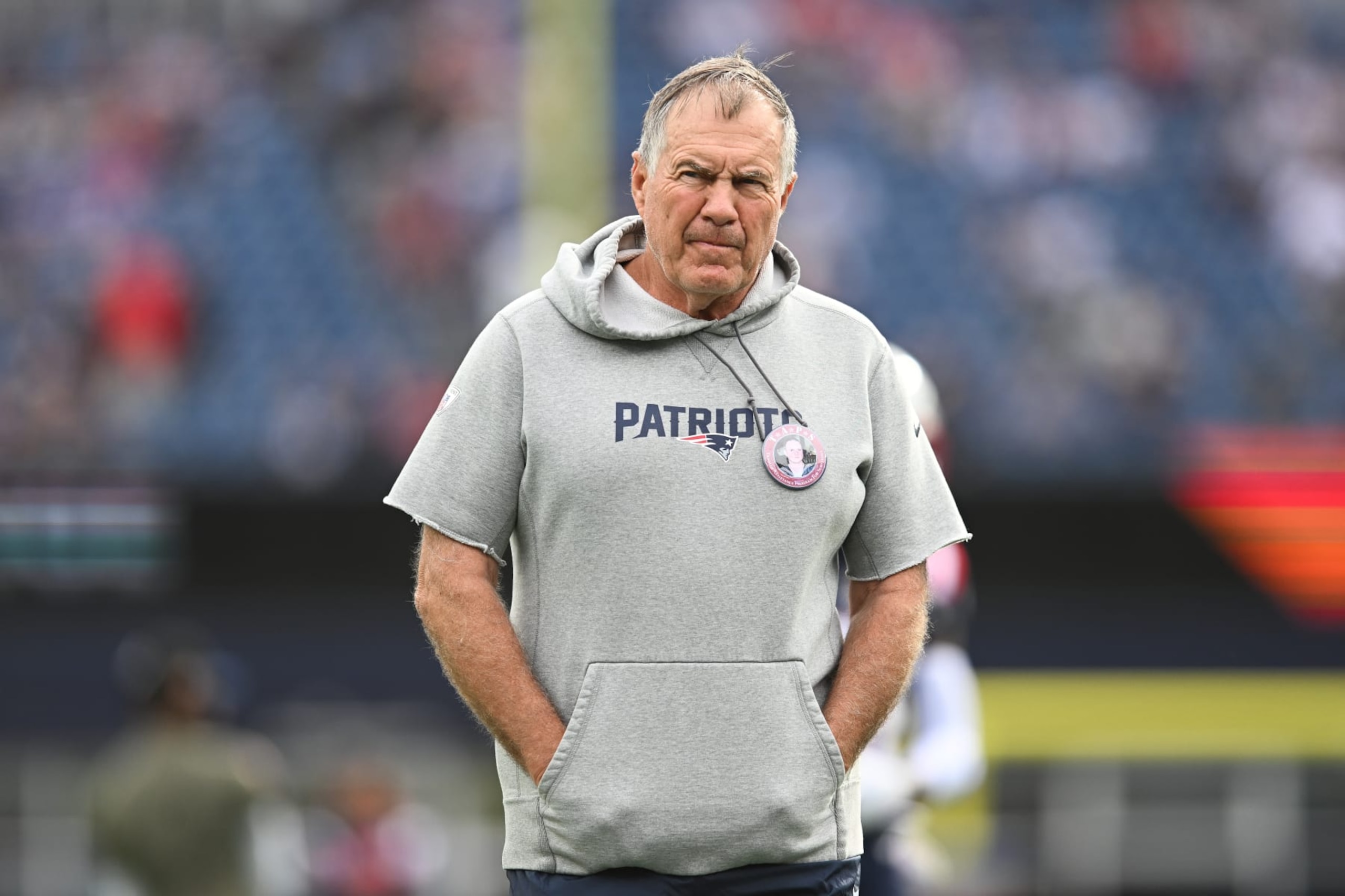 FOXBOROUGH, MA - NOVEMBER 6, 2022: Head coach Bill Belichick of the New England Patriots stands on the field prior to the game against the Indianapolis Colts at Gillette Stadium on November 6, 2022 in Foxborough, Massachusetts. (Photo by Kathryn Riley/Getty Images) FOXBOROUGH, MA - NOVEMBER 6, 2022: Head coach Bill Belichick of the New England Patriots stands on the field prior to the game against the Indianapolis Colts at Gillette Stadium on November 6, 2022 in Foxborough, Massachusetts. (Photo by Kathryn Riley/Getty Images)