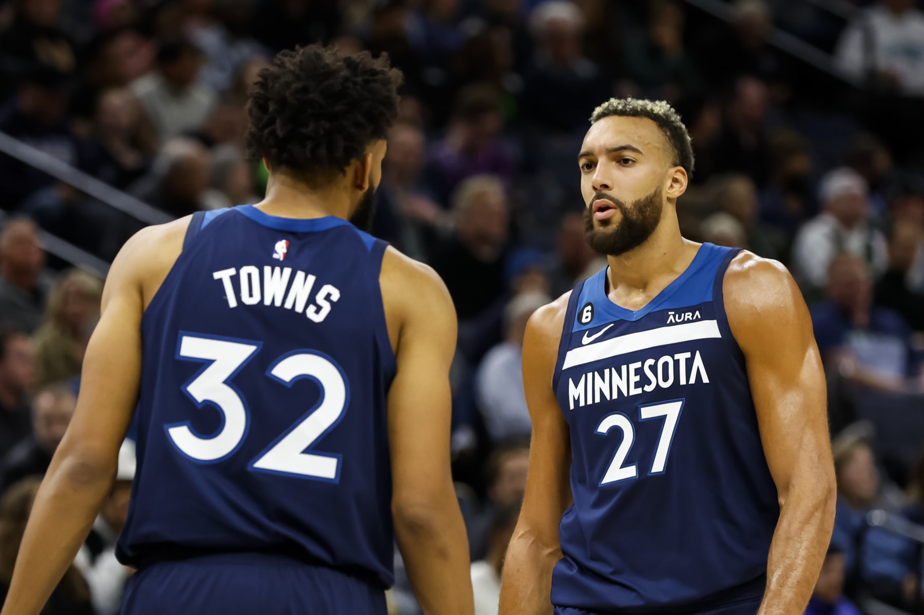MINNEAPOLIS, MN - OCTOBER 26: Karl-Anthony Towns #32 talks to Rudy Gobert #27 of the Minnesota Timberwolves in the second quarter of the game against the San Antonio Spurs at Target Center on October 26, 2022 in Minneapolis, Minnesota. The Timberwolves defeated the Spurs 134-122. NOTE TO USER: User expressly acknowledges and agrees that, by downloading and or using this Photograph, user is consenting to the terms and conditions of the Getty Images License Agreement. (Photo by David Berding/Getty Images)