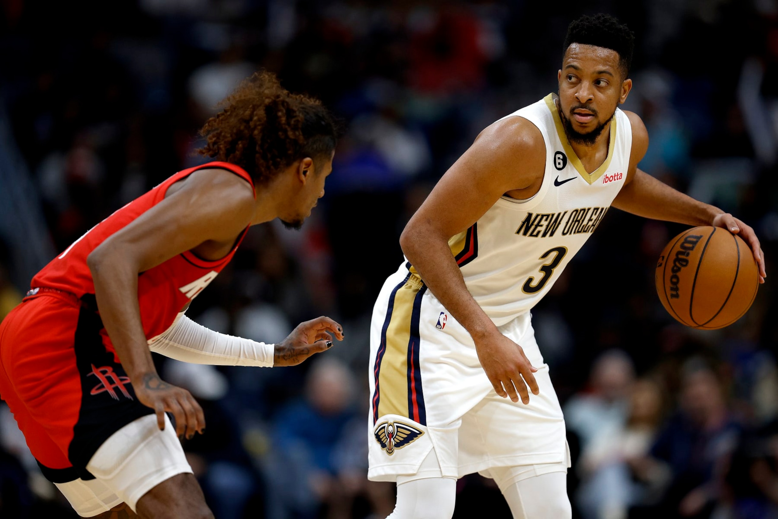 NEW ORLEANS, LOUISIANA - NOVEMBER 12: CJ McCollum #3 of the New Orleans Pelicans is defened by Jalen Green #4 of the Houston Rockets during the second quarter of an NBA game at Smoothie King Center on November 12, 2022 in New Orleans, Louisiana. NOTE TO USER: User expressly acknowledges and agrees that, by downloading and or using this photograph, User is consenting to the terms and conditions of the Getty Images License Agreement. (Photo by Sean Gardner/Getty Images) NEW ORLEANS, LOUISIANA - NOVEMBER 12: CJ McCollum #3 of the New Orleans Pelicans is defened by Jalen Green #4 of the Houston Rockets during the second quarter of an NBA game at Smoothie King Center on November 12, 2022 in New Orleans, Louisiana. NOTE TO USER: User expressly acknowledges and agrees that, by downloading and or using this photograph, User is consenting to the terms and conditions of the Getty Images License Agreement. (Photo by Sean Gardner/Getty Images)