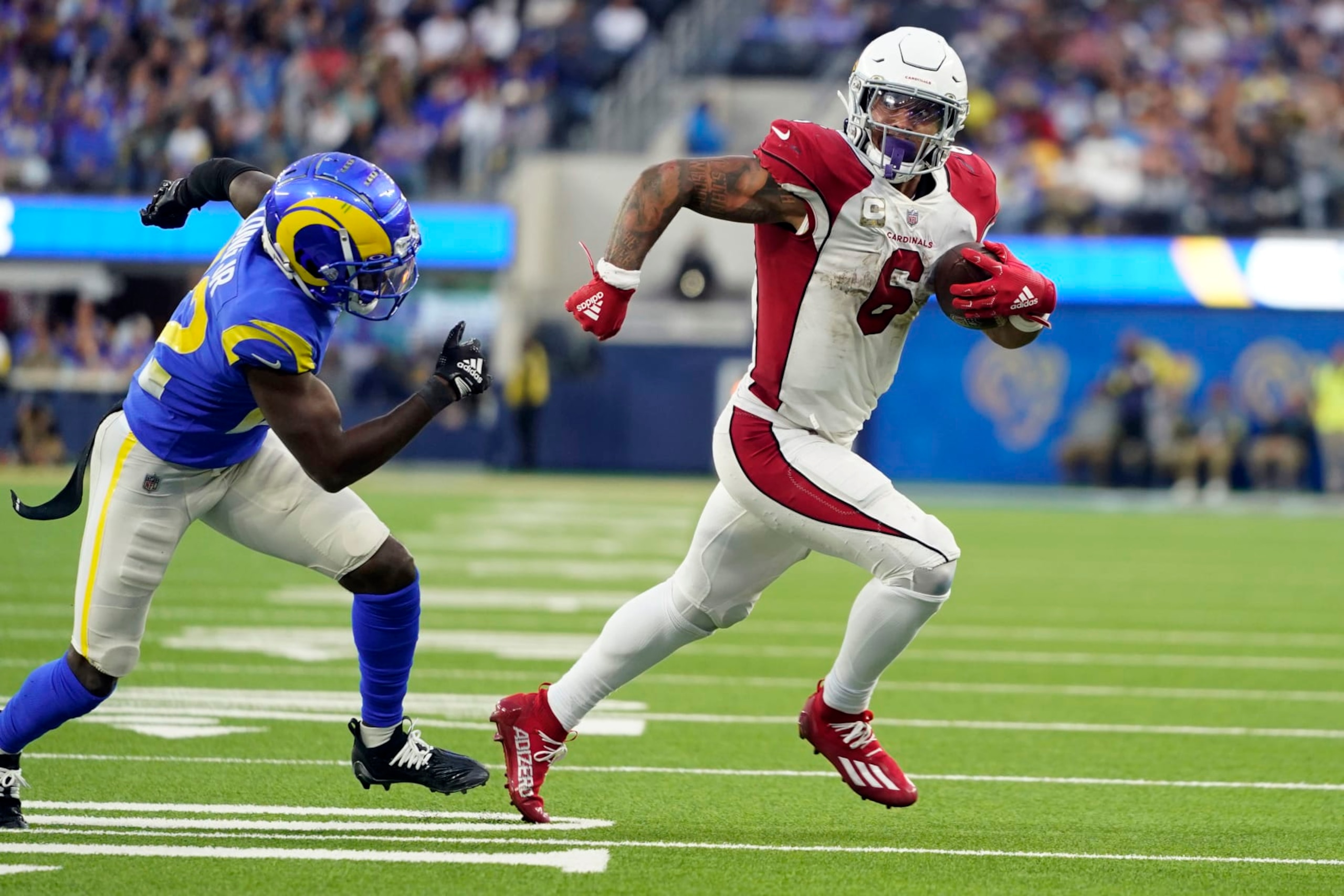 Arizona Cardinals running back James Conner (6) runs for a touchdown past Los Angeles Rams cornerback David Long Jr. during the second half of an NFL football game Sunday, Nov. 13, 2022, in Inglewood, Calif. (AP Photo/Jae C. Hong)
