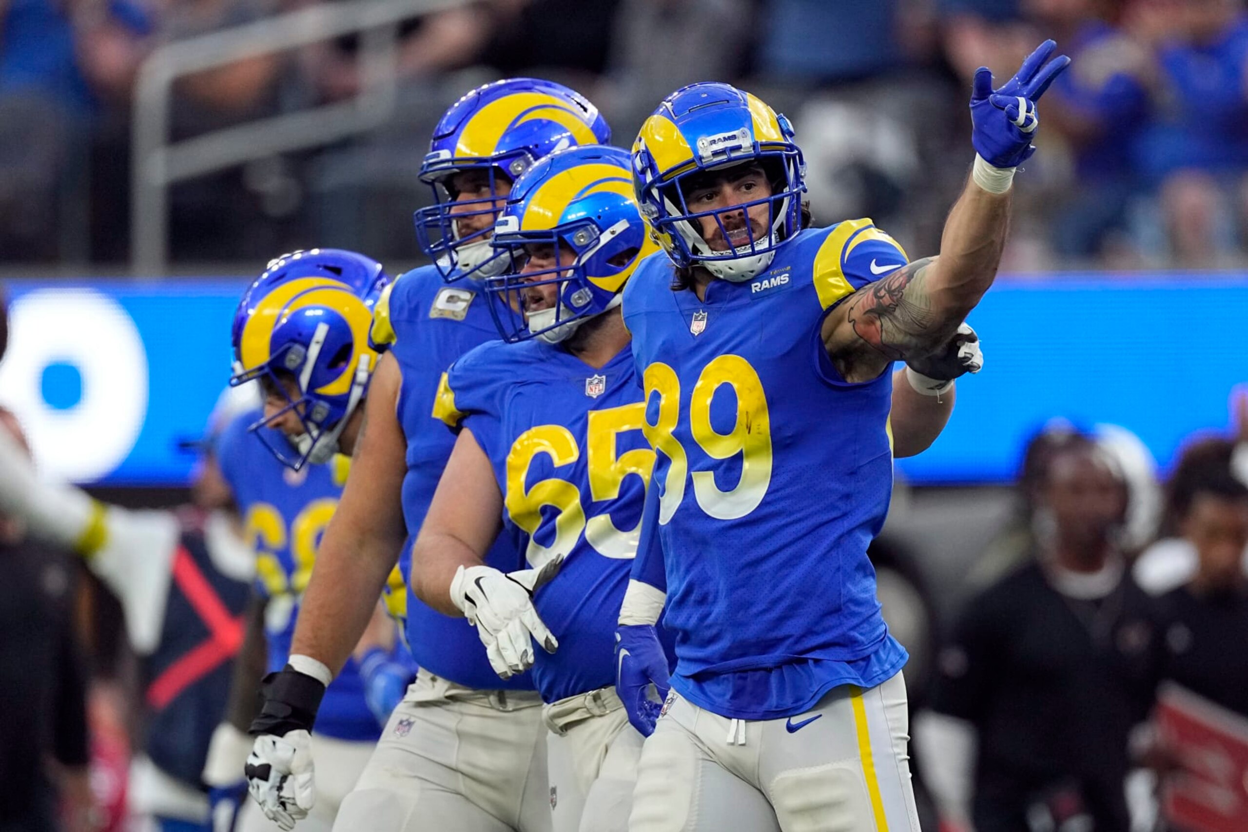 Los Angeles Rams tight end Tyler Higbee (89) signals during the second half of an NFL football game against the Arizona Cardinals Sunday, Nov. 13, 2022, in Inglewood, Calif. (AP Photo/Mark J. Terrill)