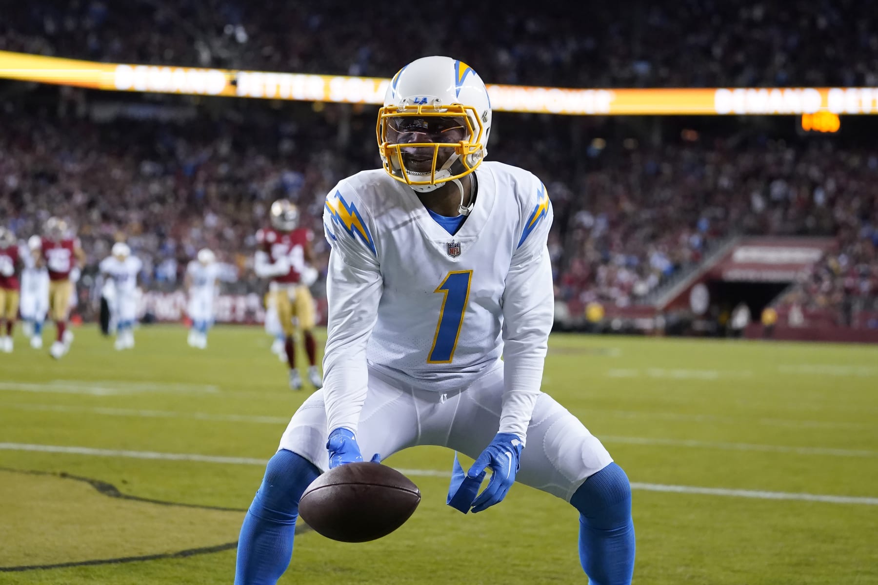 Los Angeles Chargers wide receiver DeAndre Carter (1) reacts after scoring a touchdown against the San Francisco 49ers during the first half of an NFL football game in Santa Clara, Calif., Sunday, Nov. 13, 2022. (AP Photo/Godofredo A. Vásquez)