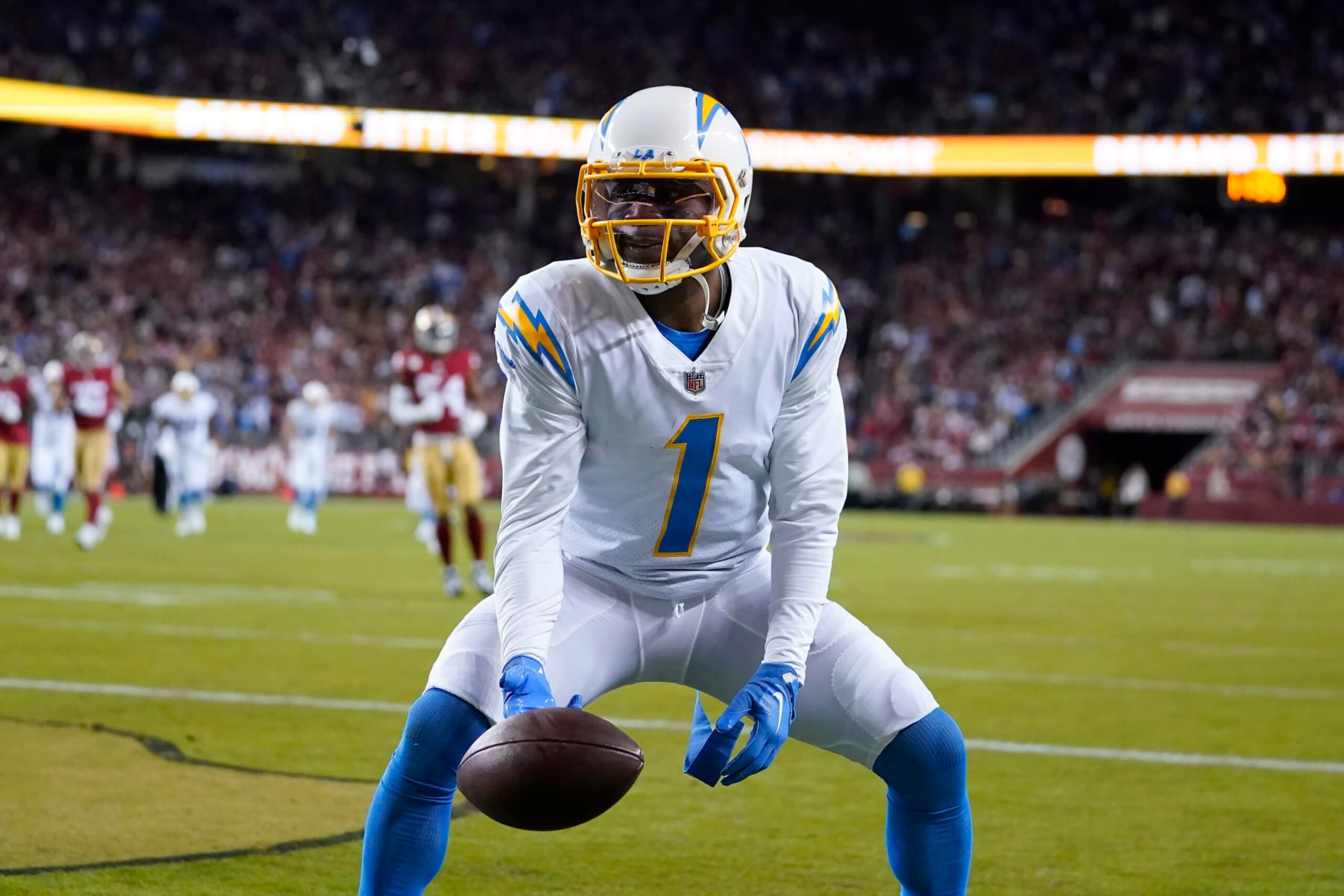 Los Angeles Chargers wide receiver DeAndre Carter (1) reacts after scoring a touchdown against the San Francisco 49ers during the first half of an NFL football game in Santa Clara, Calif., Sunday, Nov. 13, 2022. (AP Photo/Godofredo A. Vásquez)