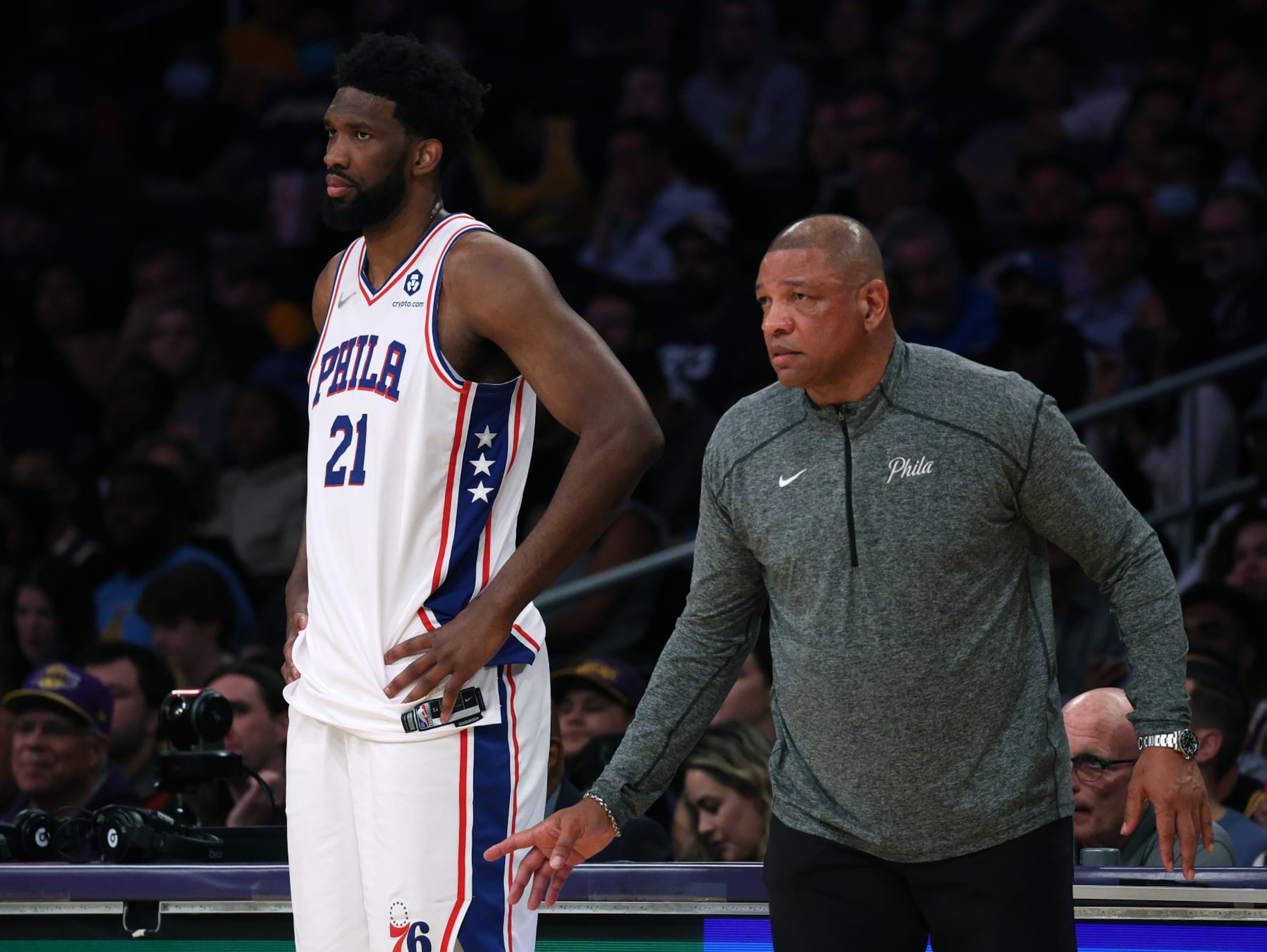LOS ANGELES, CALIFORNIA - MARCH 23: Head coach Doc Rivers and Joel Embiid #21 of the Philadelphia 76ers watch from the sidelines during a 126-121 win over the Los Angeles Lakers at Crypto.com Arena on March 23, 2022 in Los Angeles, California. (Photo by Harry How/Getty Images) NOTE TO USER: User expressly acknowledges and agrees that, by downloading and/or using this Photograph, user is consenting to the terms and conditions of the Getty Images License Agreement. Mandatory Copyright Notice: Copyright 2022 NBAE LOS ANGELES, CALIFORNIA - MARCH 23: Head coach Doc Rivers and Joel Embiid #21 of the Philadelphia 76ers watch from the sidelines during a 126-121 win over the Los Angeles Lakers at Crypto.com Arena on March 23, 2022 in Los Angeles, California. (Photo by Harry How/Getty Images) NOTE TO USER: User expressly acknowledges and agrees that, by downloading and/or using this Photograph, user is consenting to the terms and conditions of the Getty Images License Agreement. Mandatory Copyright Notice: Copyright 2022 NBAE