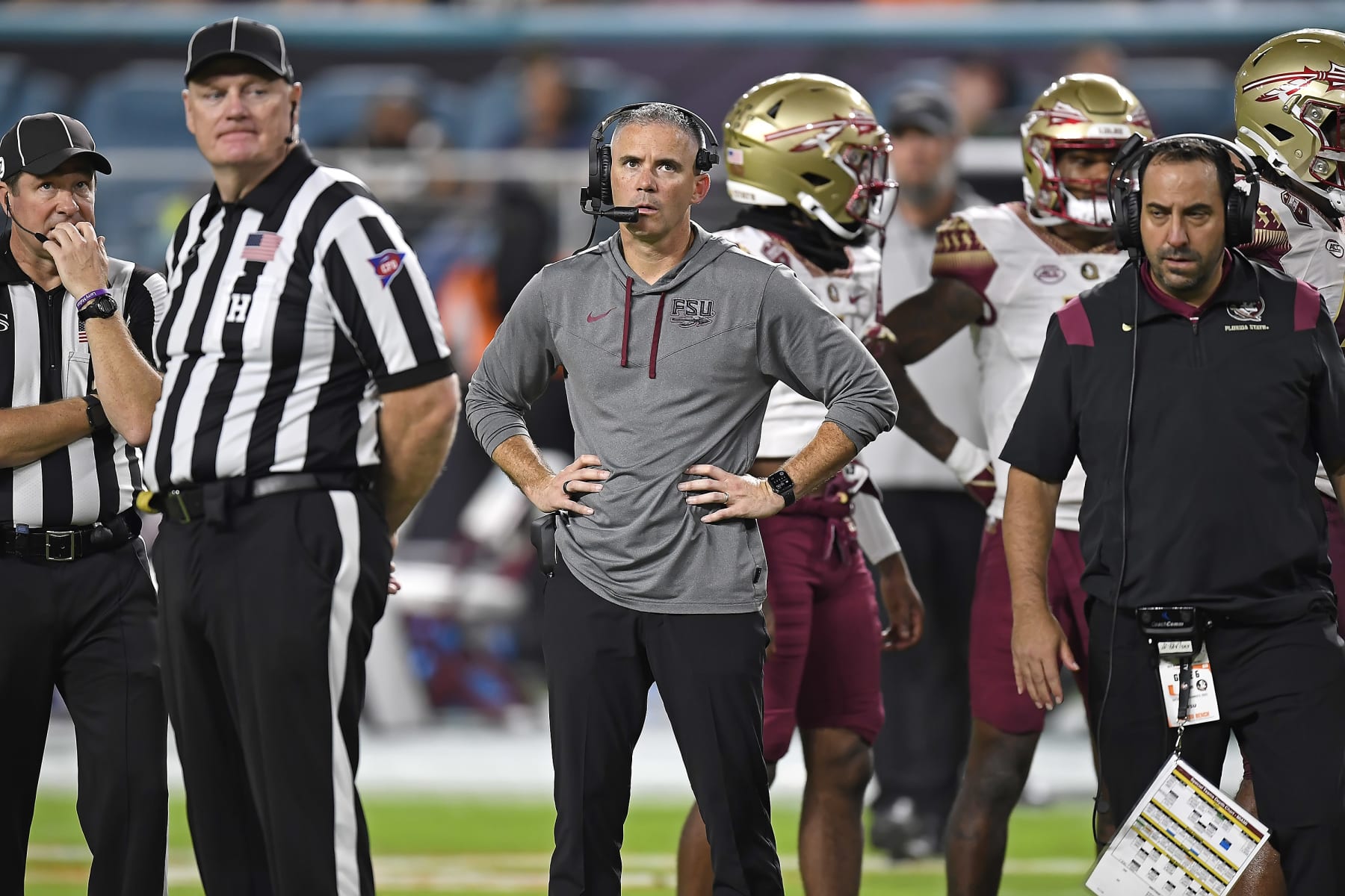 MIAMI GARDENS, FL - NOVEMBER 05:  Florida State head coach Mike Norvell watches the stadium video board during an official review in the third quarter as the Miami Hurricanes faced the Florida State Seminoles on November 5, 2022, at Hard Rock Stadium in Miami Gardens, Florida. (Photo by Samuel Lewis/Icon Sportswire via Getty Images)