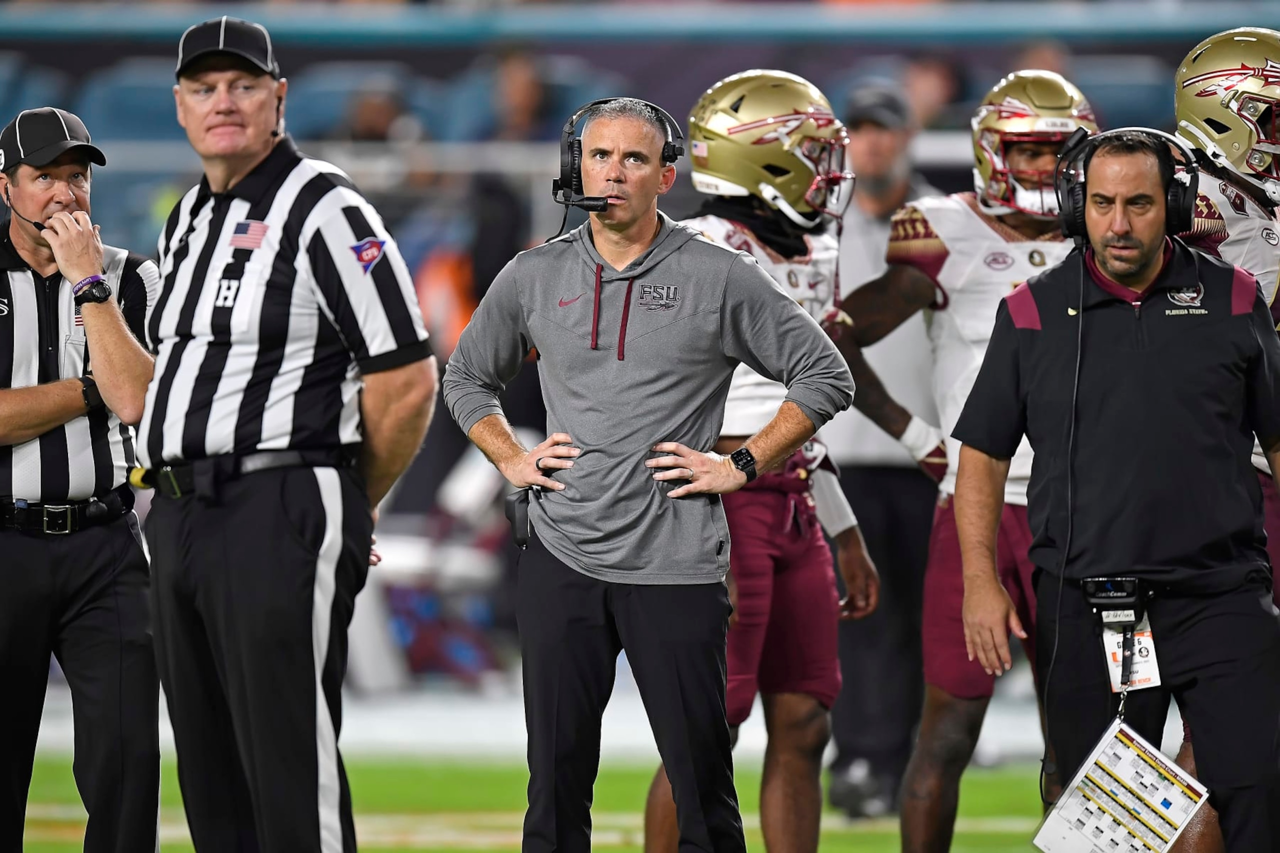 MIAMI GARDENS, FL - NOVEMBER 05: Florida State head coach Mike Norvell watches the stadium video board during an official review in the third quarter as the Miami Hurricanes faced the Florida State Seminoles on November 5, 2022, at Hard Rock Stadium in Miami Gardens, Florida. (Photo by Samuel Lewis/Icon Sportswire via Getty Images) MIAMI GARDENS, FL - NOVEMBER 05: Florida State head coach Mike Norvell watches the stadium video board during an official review in the third quarter as the Miami Hurricanes faced the Florida State Seminoles on November 5, 2022, at Hard Rock Stadium in Miami Gardens, Florida. (Photo by Samuel Lewis/Icon Sportswire via Getty Images)