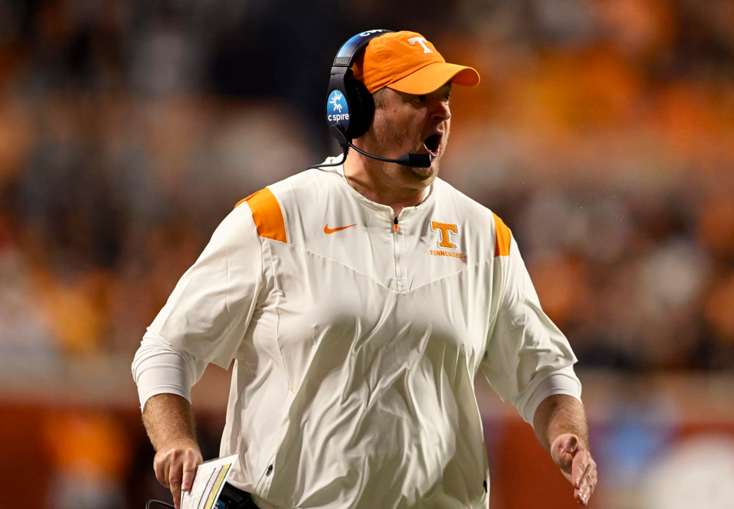 KNOXVILLE, TENNESSEE - OCTOBER 29: Head coach Josh Heupel of the Tennessee Volunteers runs down the sideline in the first quarter of the game against the Kentucky Wildcats at Neyland Stadium on October 29, 2022 in Knoxville, Tennessee. (Photo by Eakin Howard/Getty Images) KNOXVILLE, TENNESSEE - OCTOBER 29: Head coach Josh Heupel of the Tennessee Volunteers runs down the sideline in the first quarter of the game against the Kentucky Wildcats at Neyland Stadium on October 29, 2022 in Knoxville, Tennessee. (Photo by Eakin Howard/Getty Images)