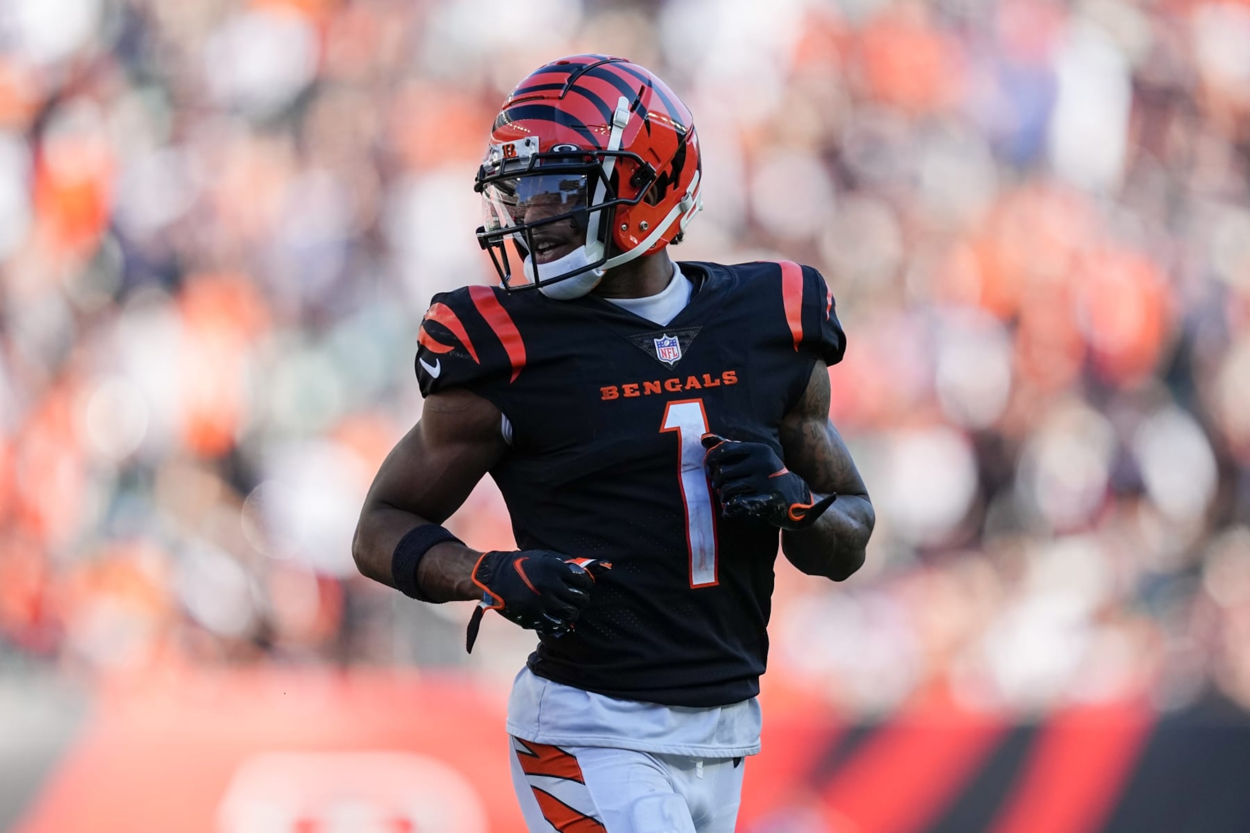 CINCINNATI, OHIO - OCTOBER 23: Ja'Marr Chase #1 of the Cincinnati Bengals jogs across the field in the fourth quarter against the Atlanta Falcons at Paycor Stadium on October 23, 2022 in Cincinnati, Ohio. (Photo by Dylan Buell/Getty Images) CINCINNATI, OHIO - OCTOBER 23: Ja'Marr Chase #1 of the Cincinnati Bengals jogs across the field in the fourth quarter against the Atlanta Falcons at Paycor Stadium on October 23, 2022 in Cincinnati, Ohio. (Photo by Dylan Buell/Getty Images)