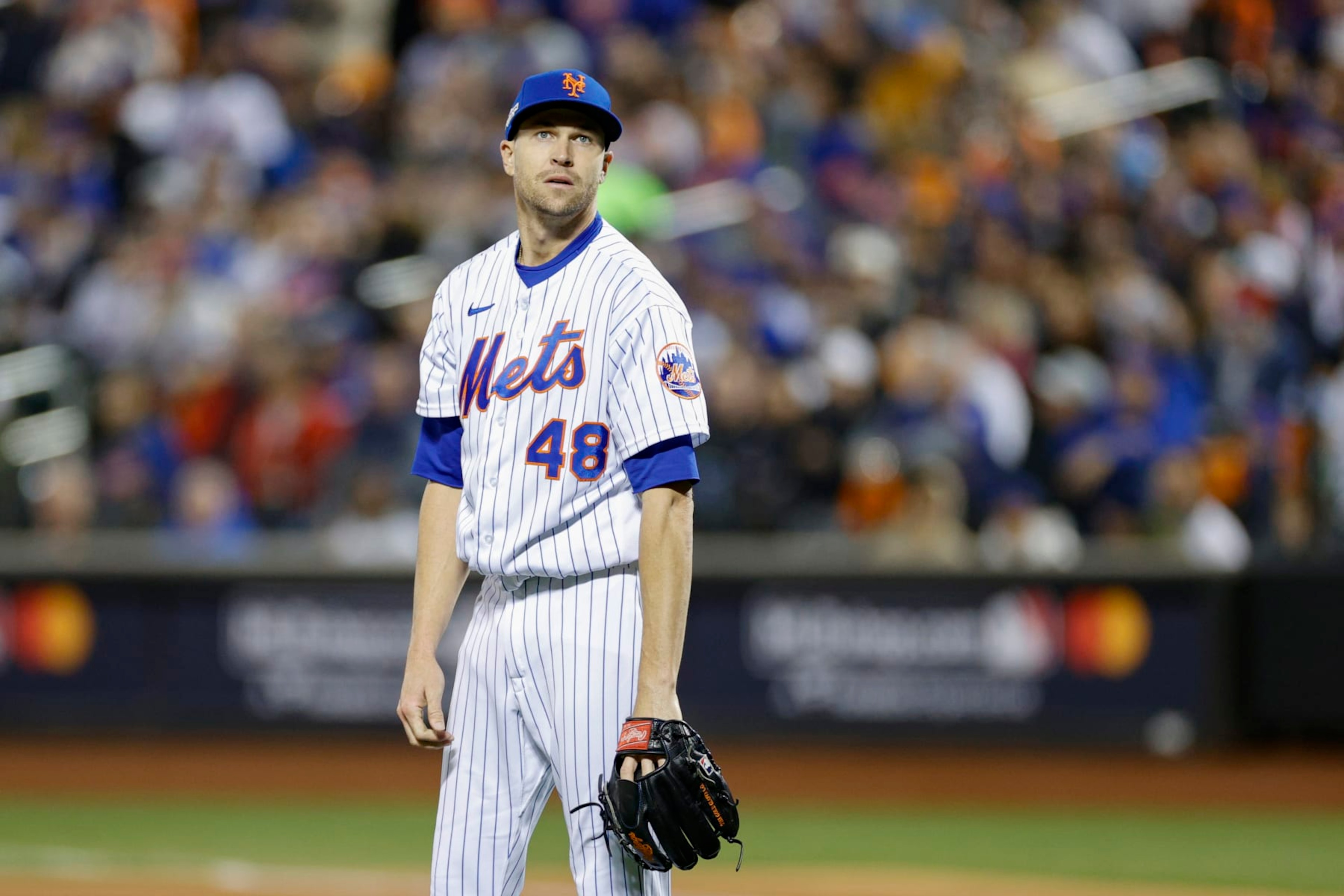 NEW YORK, NEW YORK - OCTOBER 08: Jacob deGrom #48 of the New York Mets reacts to giving up a solo home run to Trent Grisham #2 of the San Diego Padres during the third inning in game two of the Wild Card Series at Citi Field on October 08, 2022 in New York City. (Photo by Sarah Stier/Getty Images)