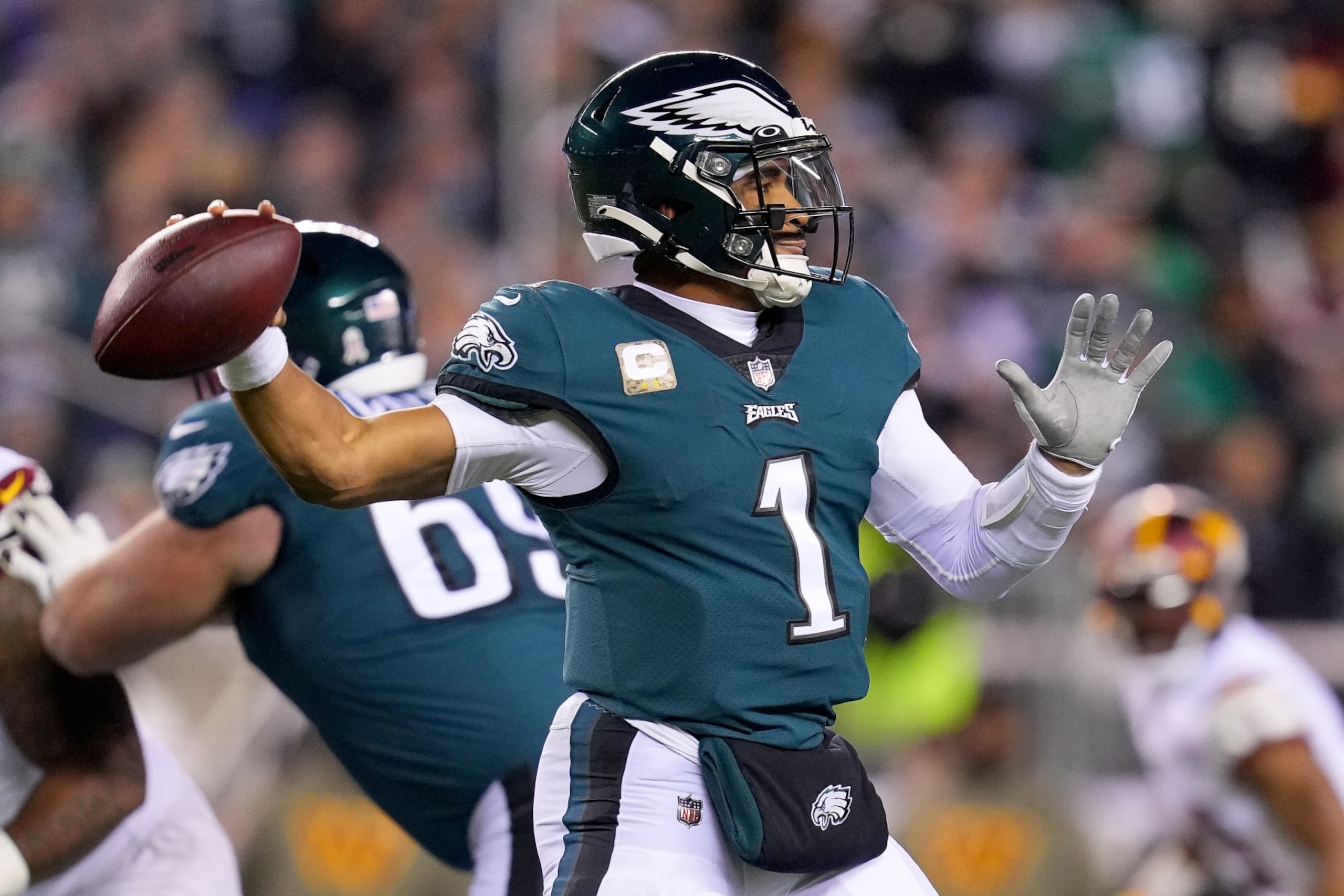 PHILADELPHIA, PENNSYLVANIA - NOVEMBER 14: Jalen Hurts #1 of the Philadelphia Eagles throws a pass against the Washington Commanders during the first quarter in the game at Lincoln Financial Field on November 14, 2022 in Philadelphia, Pennsylvania. (Photo by Mitchell Leff/Getty Images)
