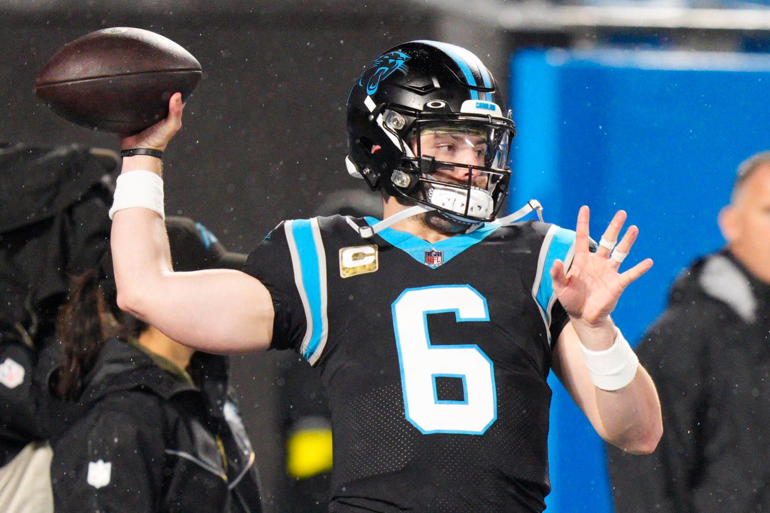 Carolina Panthers quarterback Baker Mayfield warms up before an NFL football game between the Carolina Panthers and the Atlanta Falcons on Thursday, Nov. 10, 2022, in Charlotte, N.C. (AP Photo/Jacob Kupferman)