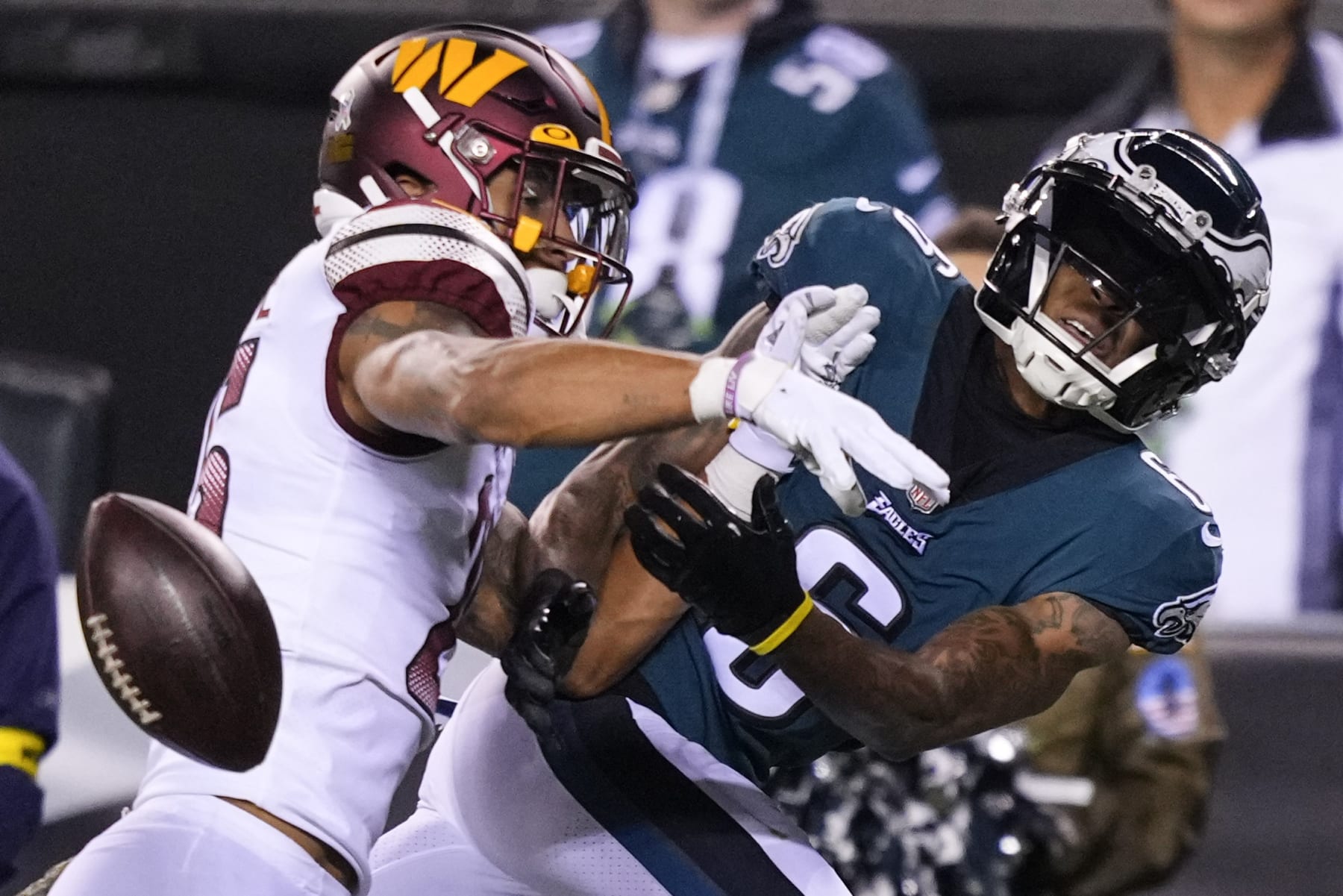 Philadelphia Eagles wide receiver DeVonta Smith (6) can't make the catch against Washington Commanders cornerback Benjamin St-Juste (25) during the first half of an NFL football game, Monday, Nov. 14, 2022, in Philadelphia. St-Juste was called for a penalty on the play. (AP Photo/Matt Slocum)