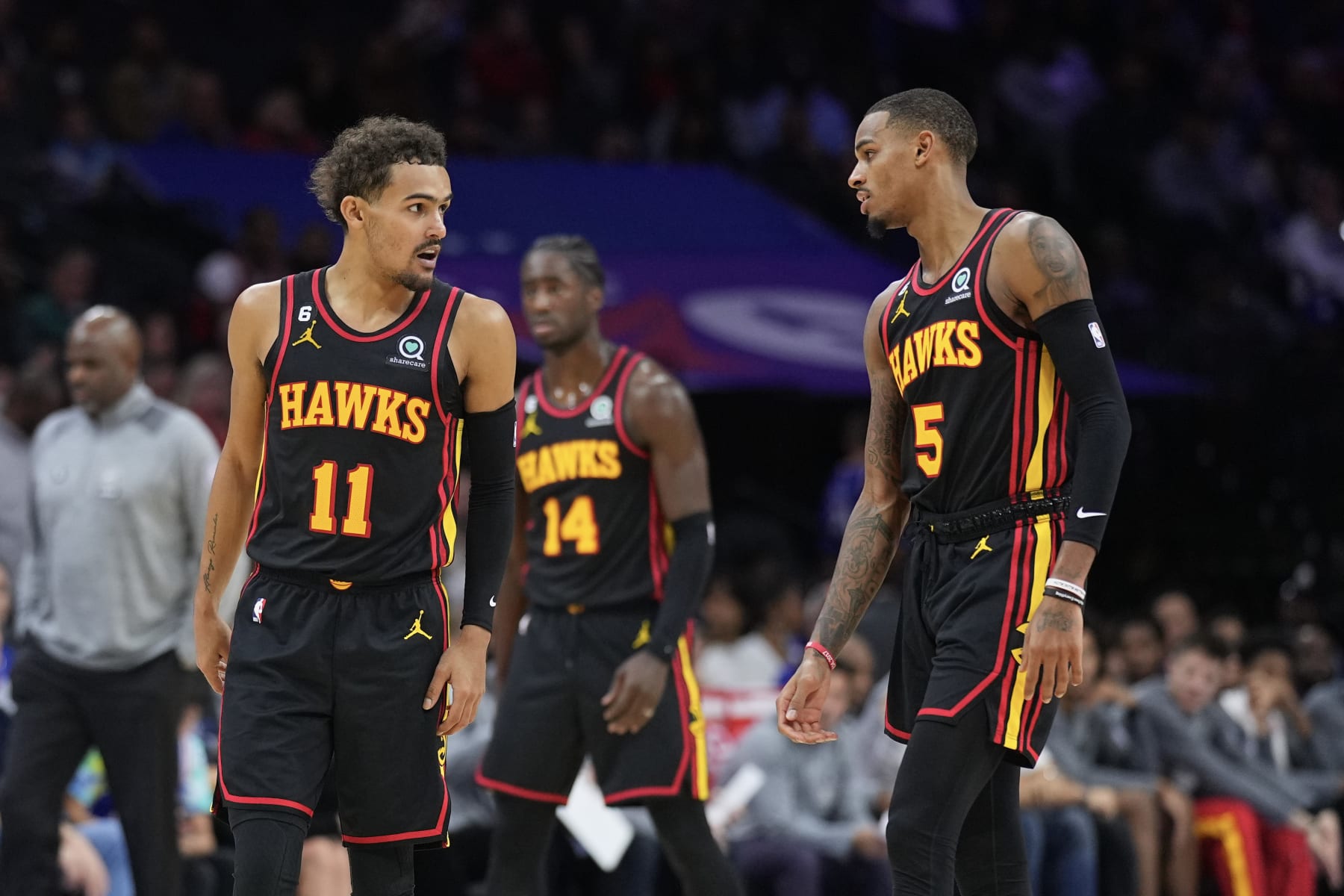 PHILADELPHIA, PA - NOVEMBER 12: Trae Young #11 and Dejounte Murray #5 of the Atlanta Hawks look on against the Philadelphia 76ers at the Wells Fargo Center on November 12, 2022 in Philadelphia, Pennsylvania. NOTE TO USER: User expressly acknowledges and agrees that, by downloading and or using this photograph, User is consenting to the terms and conditions of the Getty Images License Agreement. (Photo by Mitchell Leff/Getty Images)