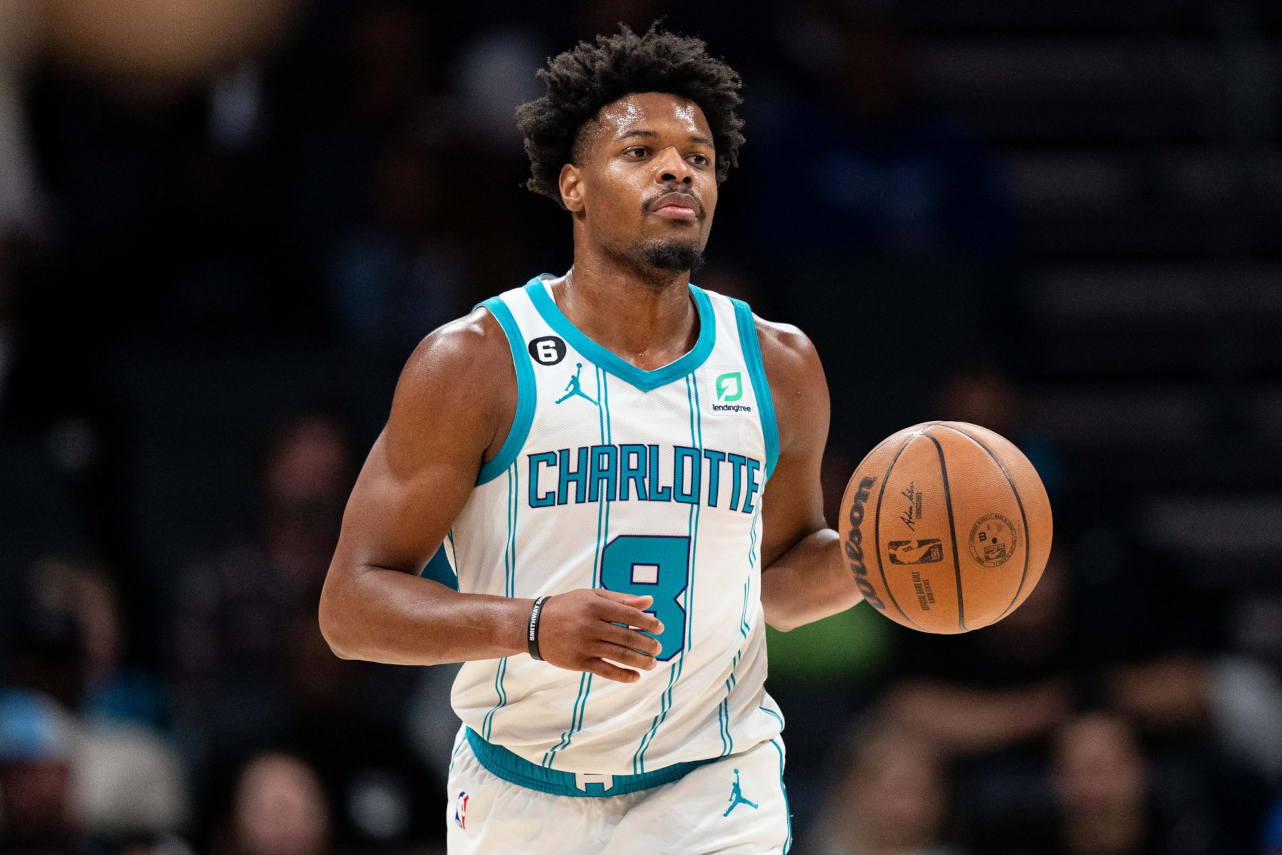 CHARLOTTE, NORTH CAROLINA - NOVEMBER 09: Dennis Smith Jr. #8 of the Charlotte Hornets brings the ball up court against the Portland Trail Blazers during their game at Spectrum Center on November 09, 2022 in Charlotte, North Carolina. NOTE TO USER: User expressly acknowledges and agrees that, by downloading and or using this photograph, User is consenting to the terms and conditions of the Getty Images License Agreement. (Photo by Jacob Kupferman/Getty Images)