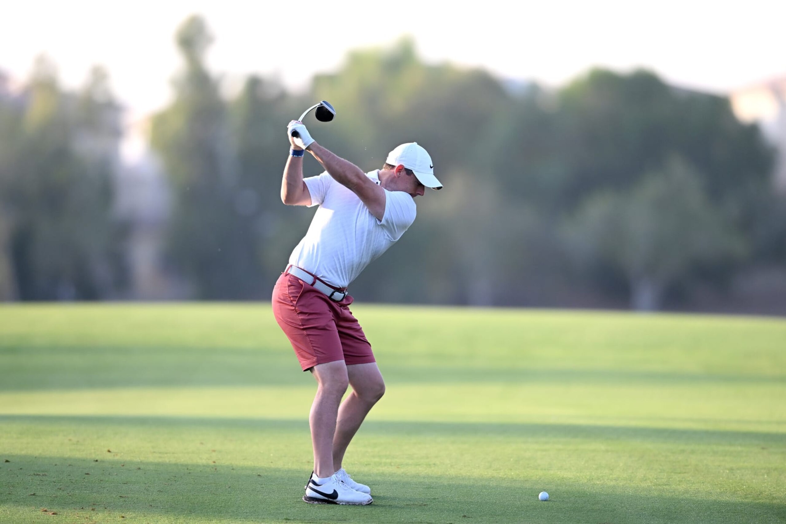 DUBAI, UNITED ARAB EMIRATES - NOVEMBER 15: Rory McIlroy of Northern Ireland plays his second shot on the 2nd hole during the DP World Tour Championship - Rolex Pro-AM prior to the DP World Tour Championship on the Earth Course at Jumeirah Golf Estates on November 15, 2022 in Dubai, United Arab Emirates. (Photo by Ross Kinnaird/Getty Images) DUBAI, UNITED ARAB EMIRATES - NOVEMBER 15: Rory McIlroy of Northern Ireland plays his second shot on the 2nd hole during the DP World Tour Championship - Rolex Pro-AM prior to the DP World Tour Championship on the Earth Course at Jumeirah Golf Estates on November 15, 2022 in Dubai, United Arab Emirates. (Photo by Ross Kinnaird/Getty Images)