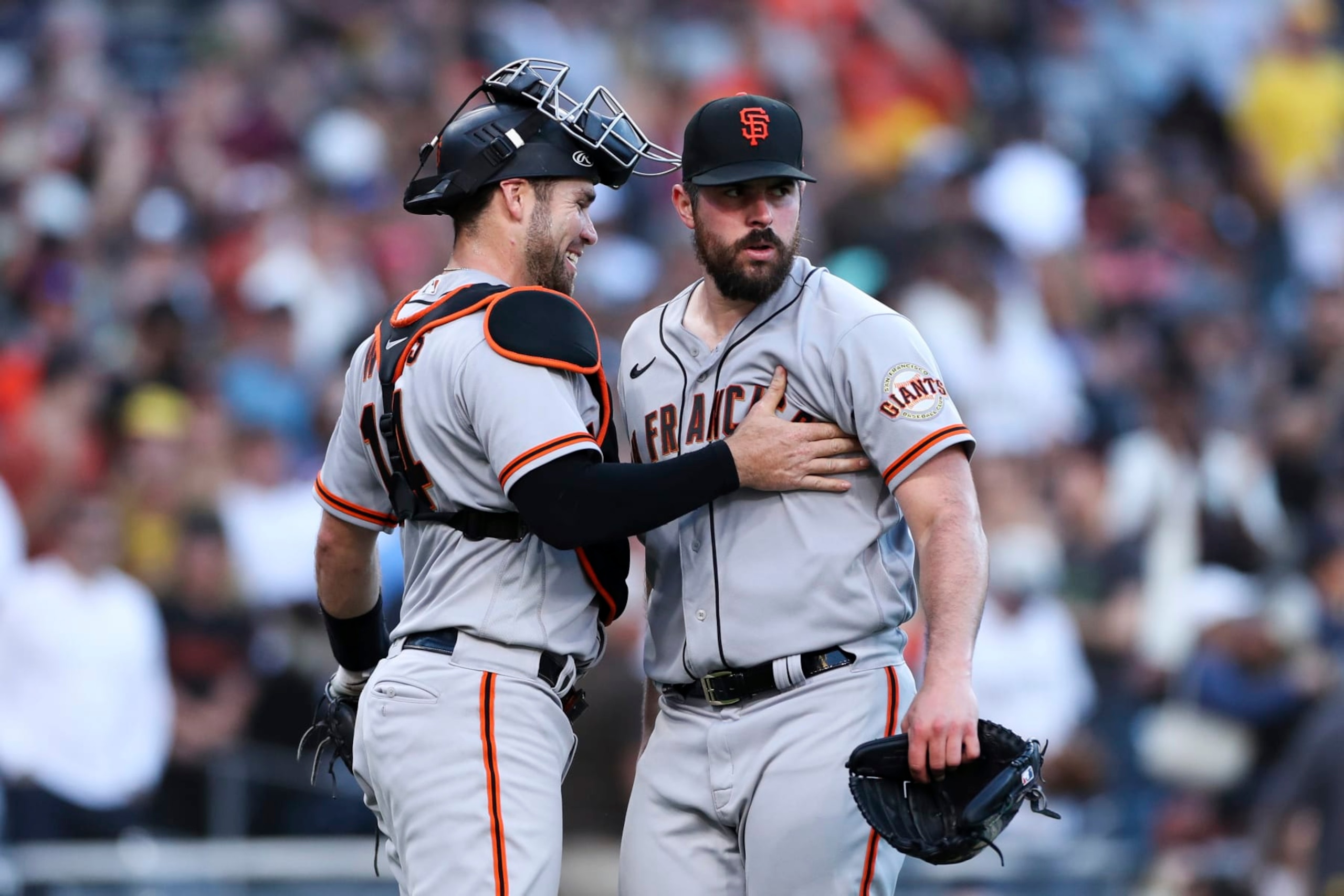 San Francisco Giants starting pitcher Carlos Rodon, right, is congratulated by catcher Austin Wynns after the team defeated the San Diego Padres in a baseball game Saturday, July 9, 2022, in San Diego. (AP Photo/Derrick Tuskan) San Francisco Giants starting pitcher Carlos Rodon, right, is congratulated by catcher Austin Wynns after the team defeated the San Diego Padres in a baseball game Saturday, July 9, 2022, in San Diego. (AP Photo/Derrick Tuskan)