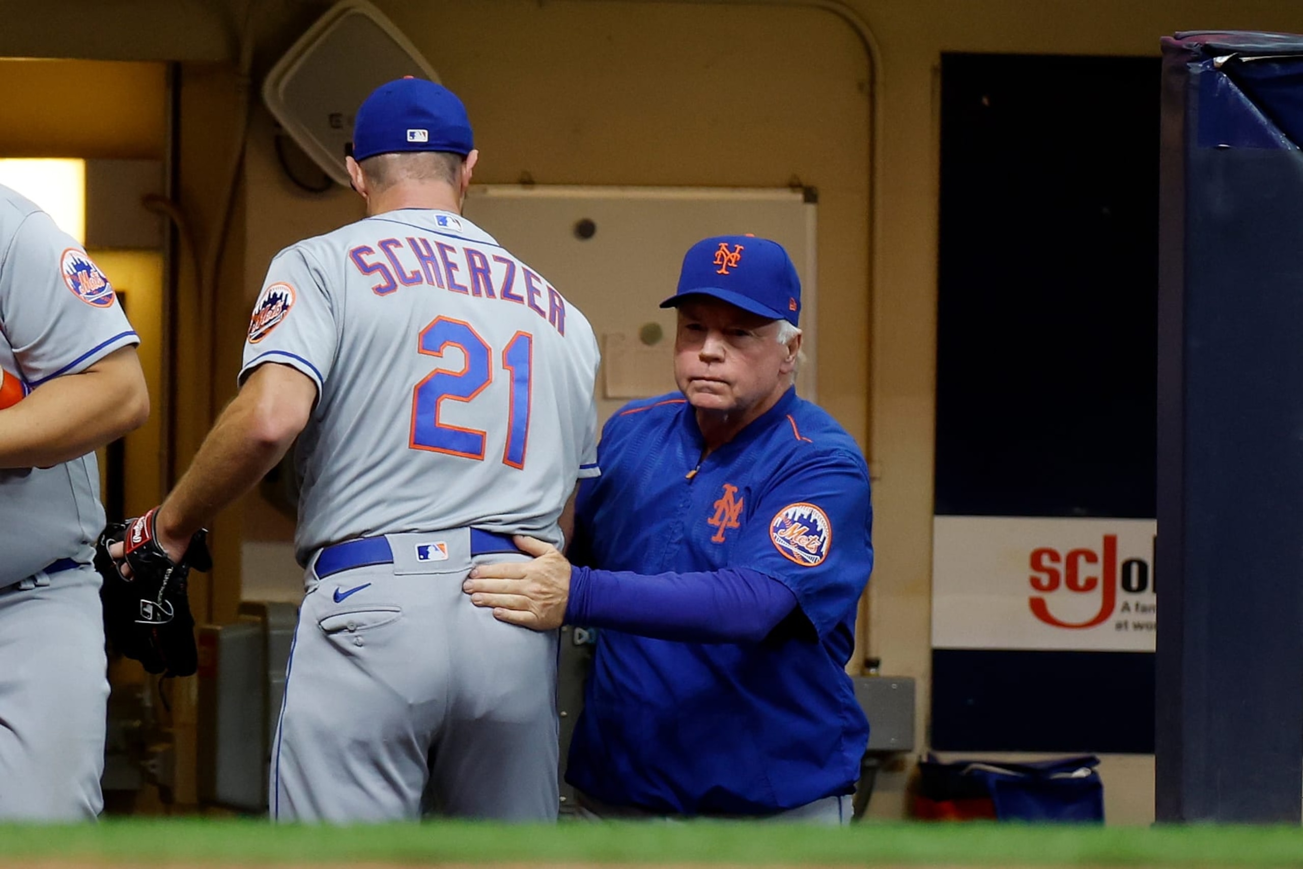 MILWAUKEE, WISCONSIN - SEPTEMBER 19: Buck Showalter #11 of the New York Mets takes Max Scherzer #21 out of the game after the sixth inning. Max Scherzer had given up no hits against the Milwaukee Brewers at American Family Field on September 19, 2022 in Milwaukee, Wisconsin. (Photo by John Fisher/Getty Images) MILWAUKEE, WISCONSIN - SEPTEMBER 19: Buck Showalter #11 of the New York Mets takes Max Scherzer #21 out of the game after the sixth inning. Max Scherzer had given up no hits against the Milwaukee Brewers at American Family Field on September 19, 2022 in Milwaukee, Wisconsin. (Photo by John Fisher/Getty Images)
