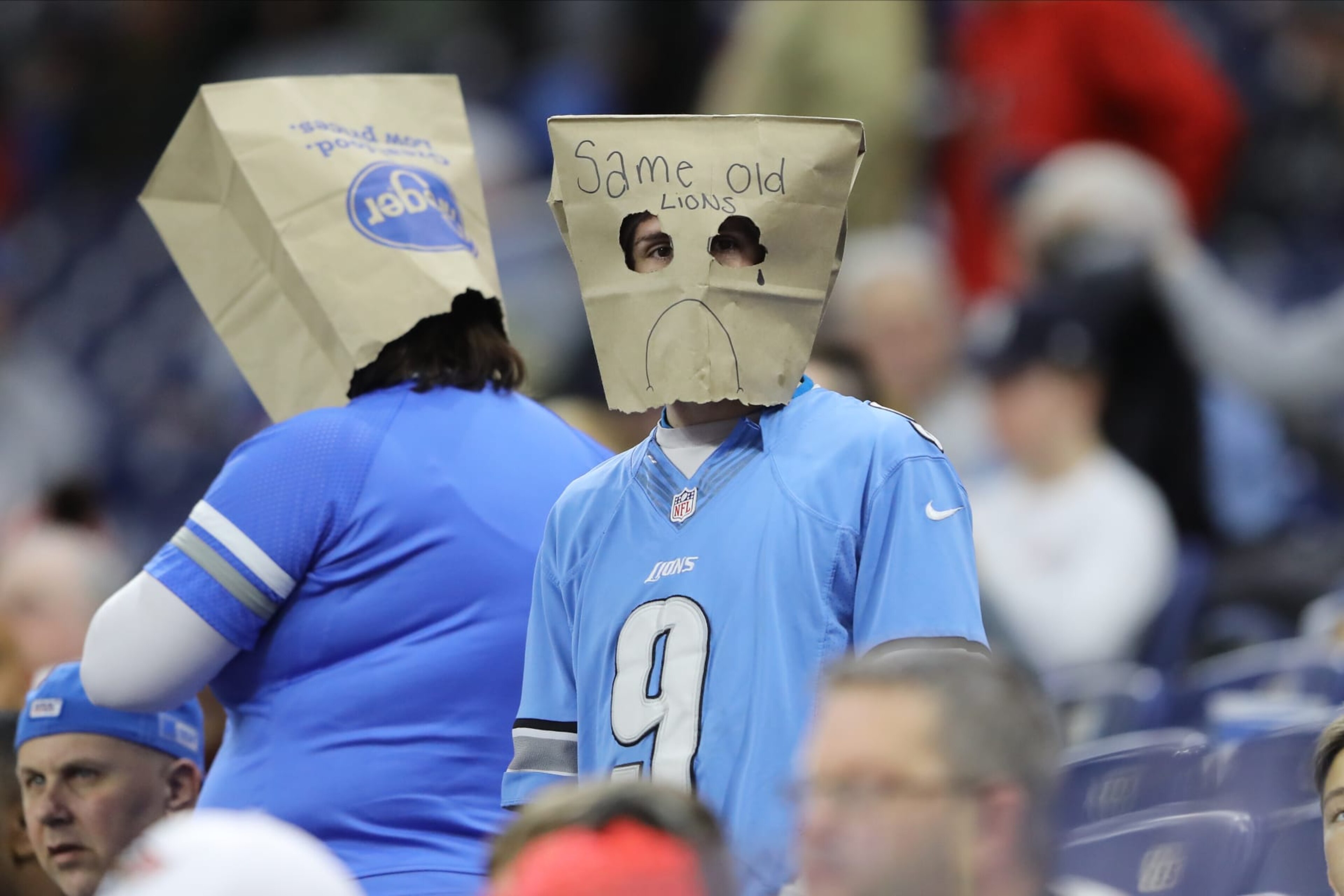 DETROIT, MI - DECEMBER 15: A Detroit Lions fan wears a paper bag while watching the game against the Tampa Bay Buccaneers at Ford Field on December 15, 2019 in Detroit, Michigan. (Photo by Rey Del Rio/Getty Images) DETROIT, MI - DECEMBER 15: A Detroit Lions fan wears a paper bag while watching the game against the Tampa Bay Buccaneers at Ford Field on December 15, 2019 in Detroit, Michigan. (Photo by Rey Del Rio/Getty Images)