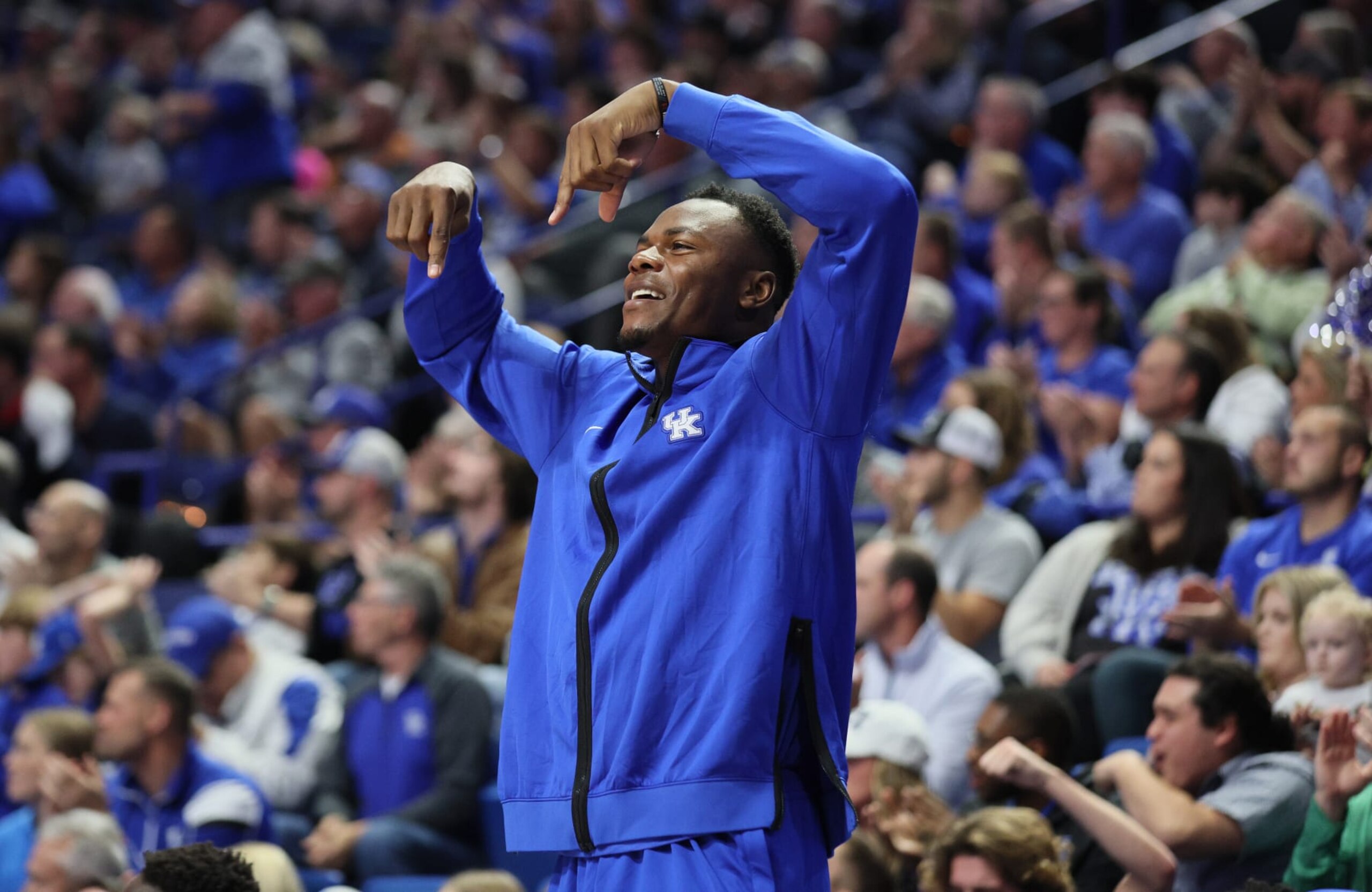LEXINGTON, KENTUCKY - NOVEMBER 11: Oscar Tshiebwe #34 of the Kentucky Wildcats cheers from the bench during the game against the Duquesne Dukes at Rupp Arena on November 11, 2022 in Lexington, Kentucky. (Photo by Andy Lyons/Getty Images) LEXINGTON, KENTUCKY - NOVEMBER 11: Oscar Tshiebwe #34 of the Kentucky Wildcats cheers from the bench during the game against the Duquesne Dukes at Rupp Arena on November 11, 2022 in Lexington, Kentucky. (Photo by Andy Lyons/Getty Images)
