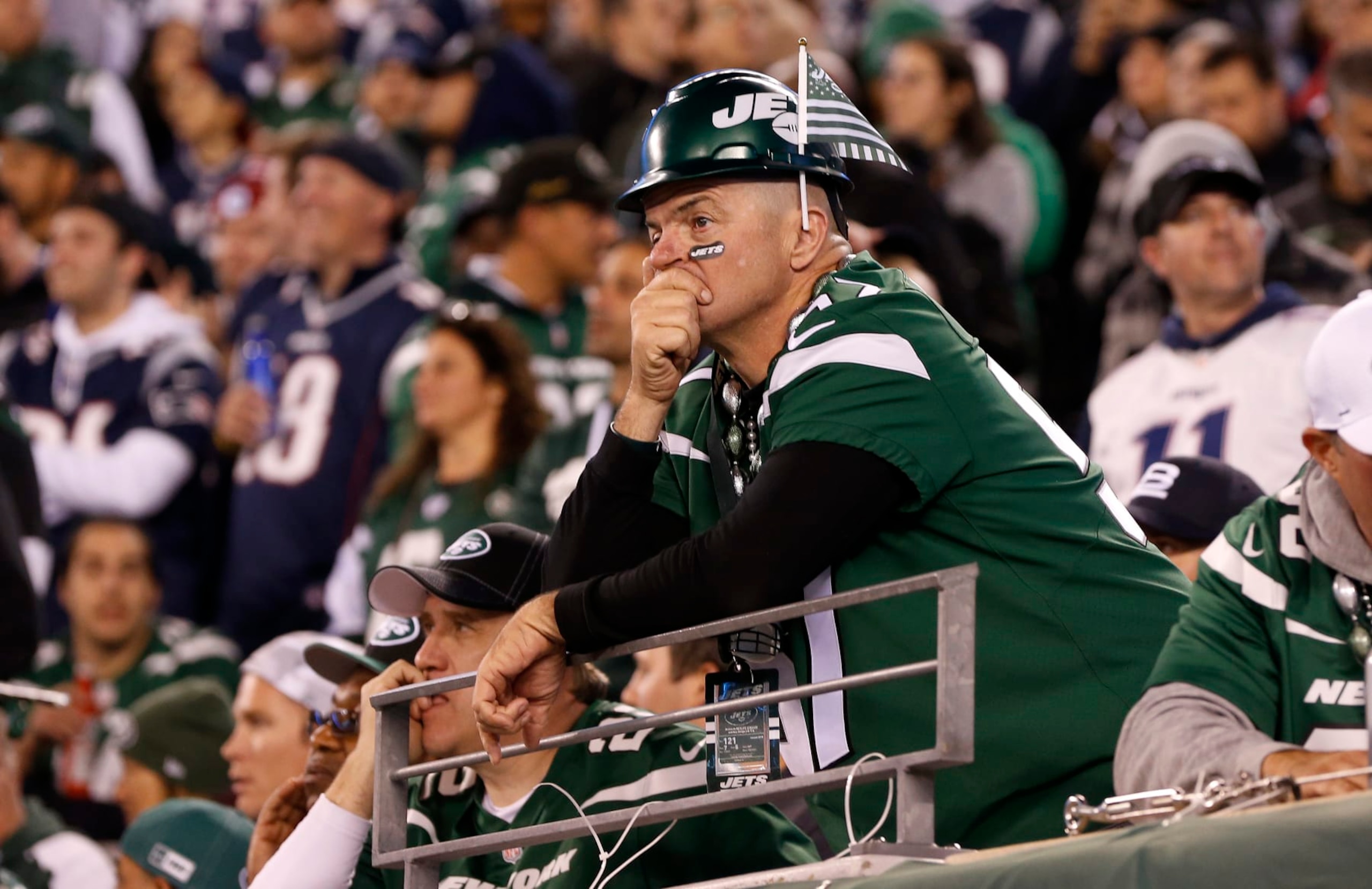EAST RUTHERFORD, NEW JERSEY - OCTOBER 21: (NEW YORK DAILIES OUT) New York Jets fans react during a game against the New England Patriots at MetLife Stadium on October 21, 2019 in East Rutherford, New Jersey. The Patriots defeated the Jets 33-0. (Photo by Jim McIsaac/Getty Images) EAST RUTHERFORD, NEW JERSEY - OCTOBER 21: (NEW YORK DAILIES OUT) New York Jets fans react during a game against the New England Patriots at MetLife Stadium on October 21, 2019 in East Rutherford, New Jersey. The Patriots defeated the Jets 33-0. (Photo by Jim McIsaac/Getty Images)