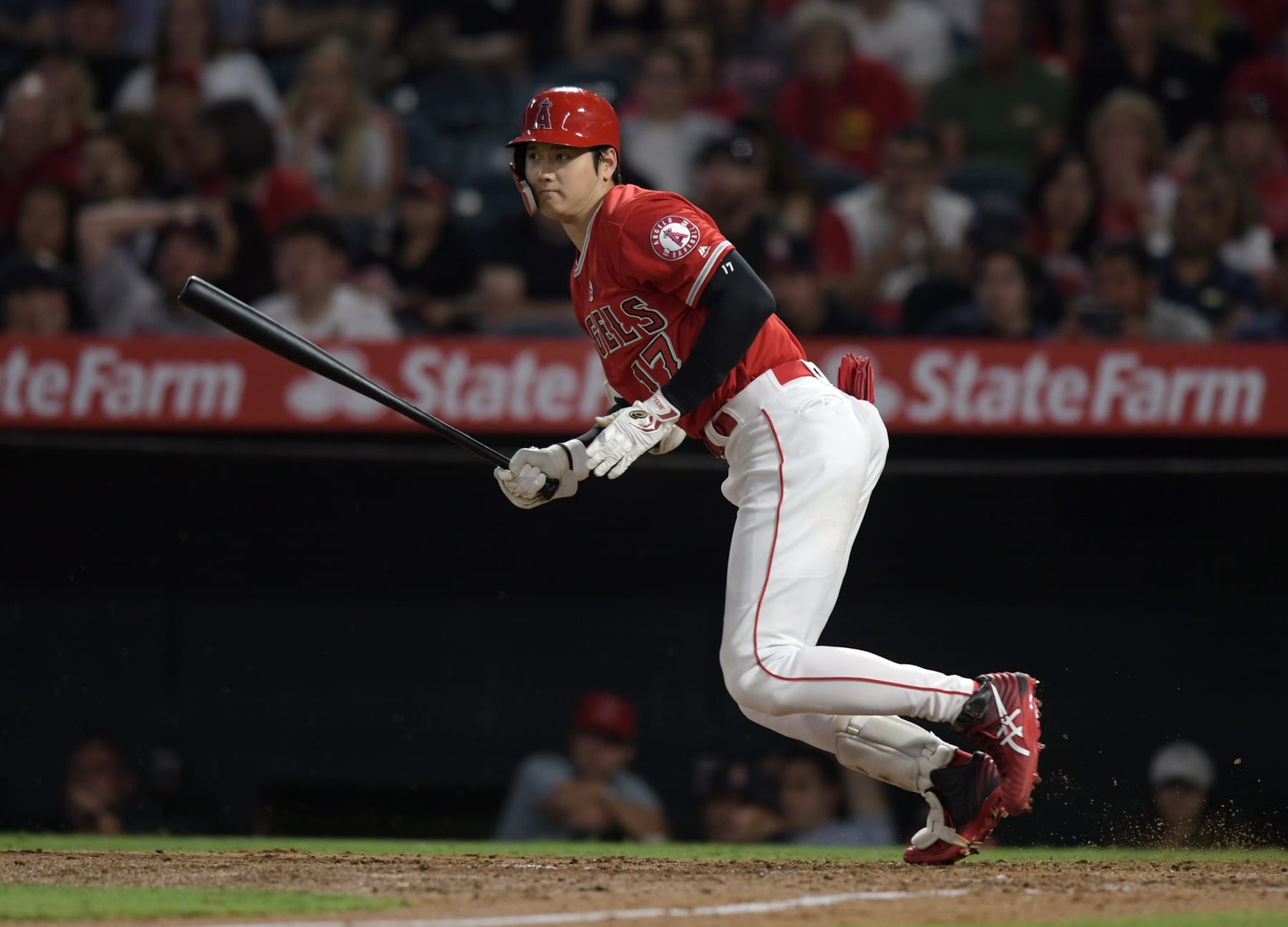 ANAHEIM, CA - JULY 17: Los Angeles Angels designated hitter Shohei Ohtani (17) hits a single in the fifth inning of a game against the Houston Astros played on July 17, 2018 at Angel Stadium of Anaheim in Anaheim, CA. (Photo by John Cordes/Icon Sportswire via Getty Images) ANAHEIM, CA - JULY 17: Los Angeles Angels designated hitter Shohei Ohtani (17) hits a single in the fifth inning of a game against the Houston Astros played on July 17, 2018 at Angel Stadium of Anaheim in Anaheim, CA. (Photo by John Cordes/Icon Sportswire via Getty Images)
