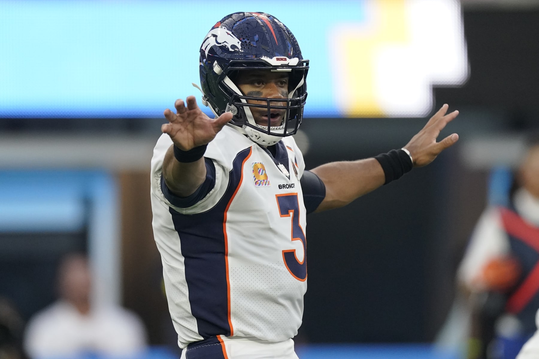 Denver Broncos quarterback Russell Wilson (3) calls a play against the Los Angeles Chargers during the first half of an NFL football game, Monday, Oct. 17, 2022, in Inglewood, Calif. (AP Photo/Mark J. Terrill)