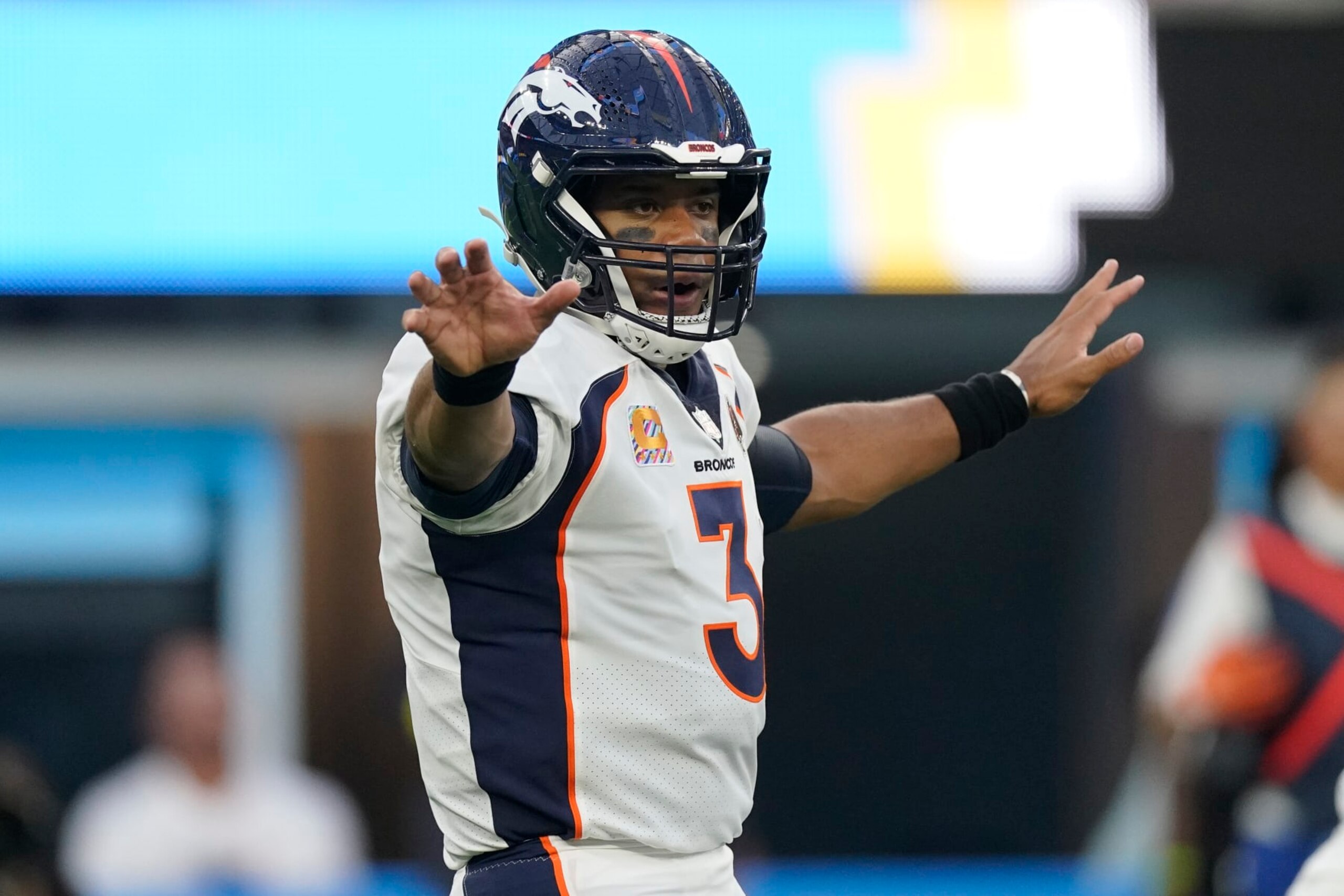 Denver Broncos quarterback Russell Wilson (3) calls a play against the Los Angeles Chargers during the first half of an NFL football game, Monday, Oct. 17, 2022, in Inglewood, Calif. (AP Photo/Mark J. Terrill)