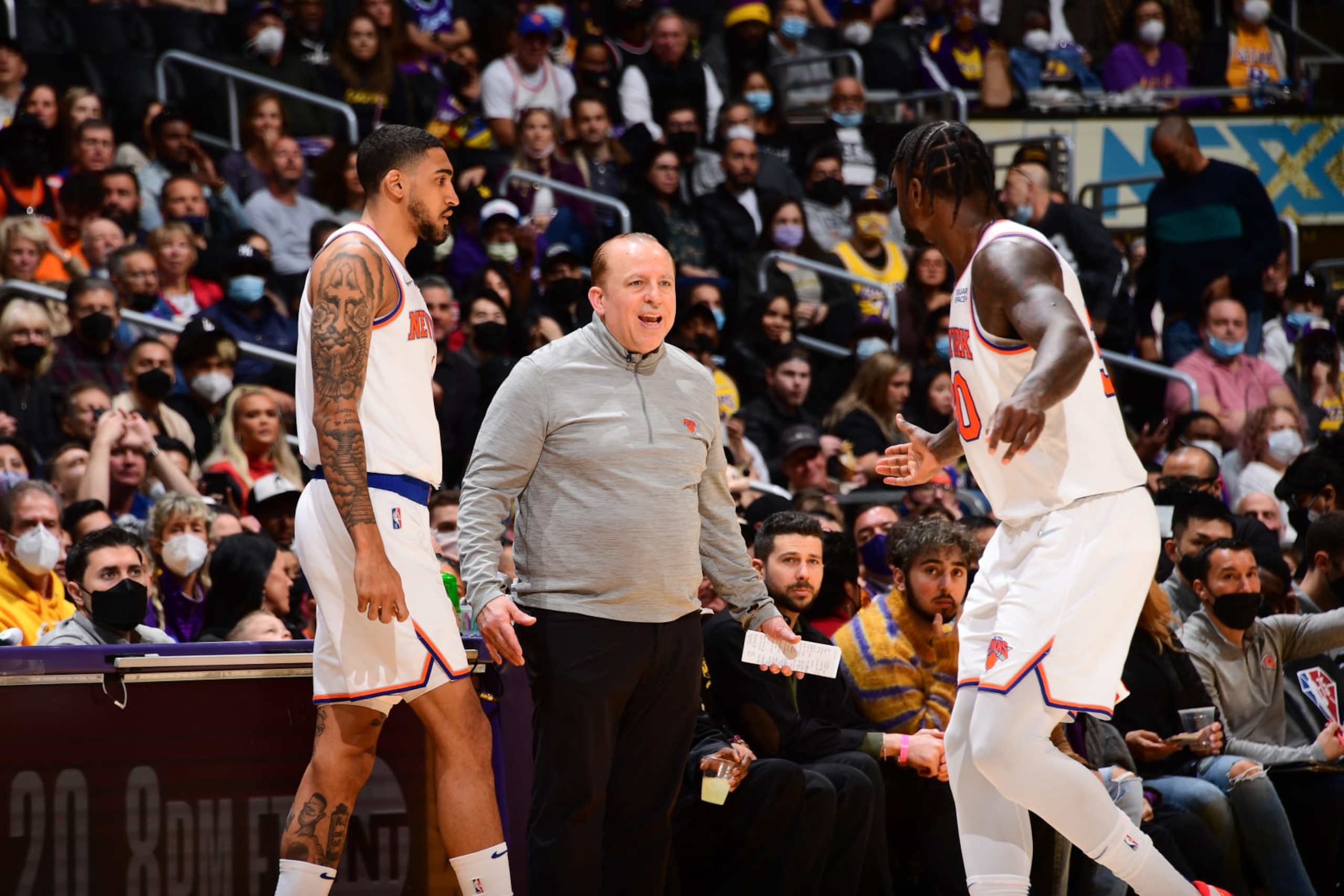 LOS ANGELES, CA - FEBRUARY 5: Head Coach Tom Thibodeau of the New York Knicks talks to Obi Toppin #1 of the New York Knicks and Julius Randle #30 of the New York Knicks during the game against the Los Angeles Lakers on February 5, 2022 at Crypto.Com Arena in Los Angeles, California. NOTE TO USER: User expressly acknowledges and agrees that, by downloading and/or using this Photograph, user is consenting to the terms and conditions of the Getty Images License Agreement. Mandatory Copyright Notice: Copyright 2022 NBAE (Photo by Adam Pantozzi/NBAE via Getty Images)