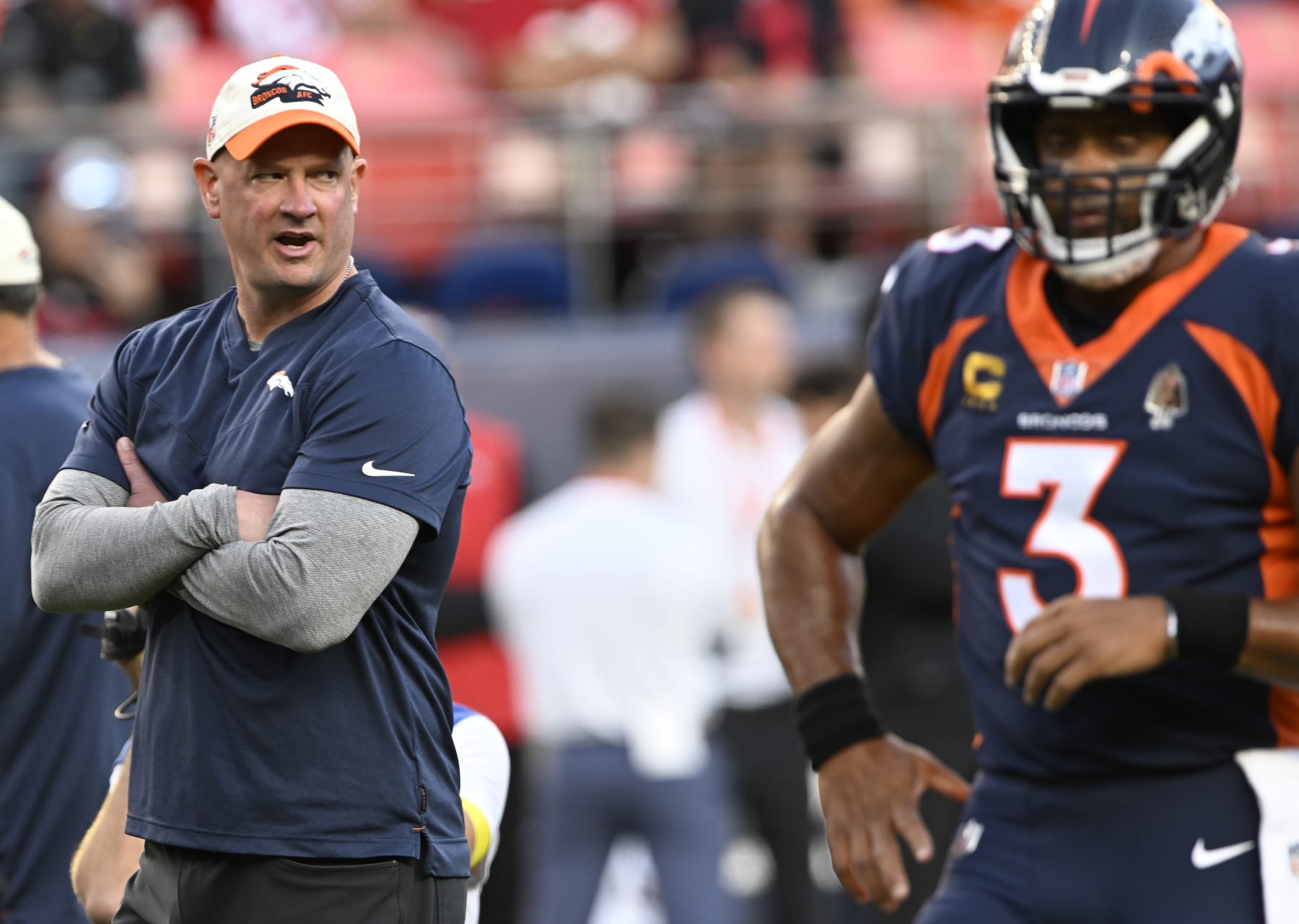 DENVER, COLORADO - SEPTEMBER 25: Denver Broncos head coach Nathaniel Hackett and Denver Broncos quarterback Russell Wilson (3) takes the field before the start of the game at Empower Field on September 25, 2022 in Denver, Colorado. The Denver Broncos took on the San Francisco 49ers during week 3 of the NFL season. (Photo by  RJ Sangosti/MediaNews Group/The Denver Post via Getty Images)