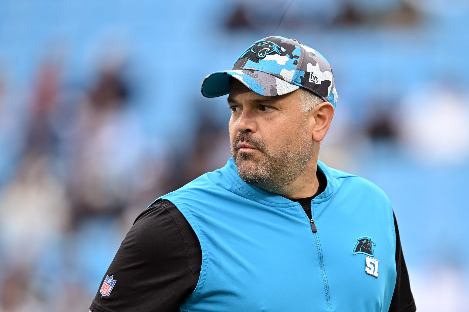 CHARLOTTE, NORTH CAROLINA - OCTOBER 02: Head coach Matt Rhule of the Carolina Panthers watches his team warm up during their game against the Arizona Cardinals at Bank of America Stadium on October 02, 2022 in Charlotte, North Carolina. (Photo by Grant Halverson/Getty Images)