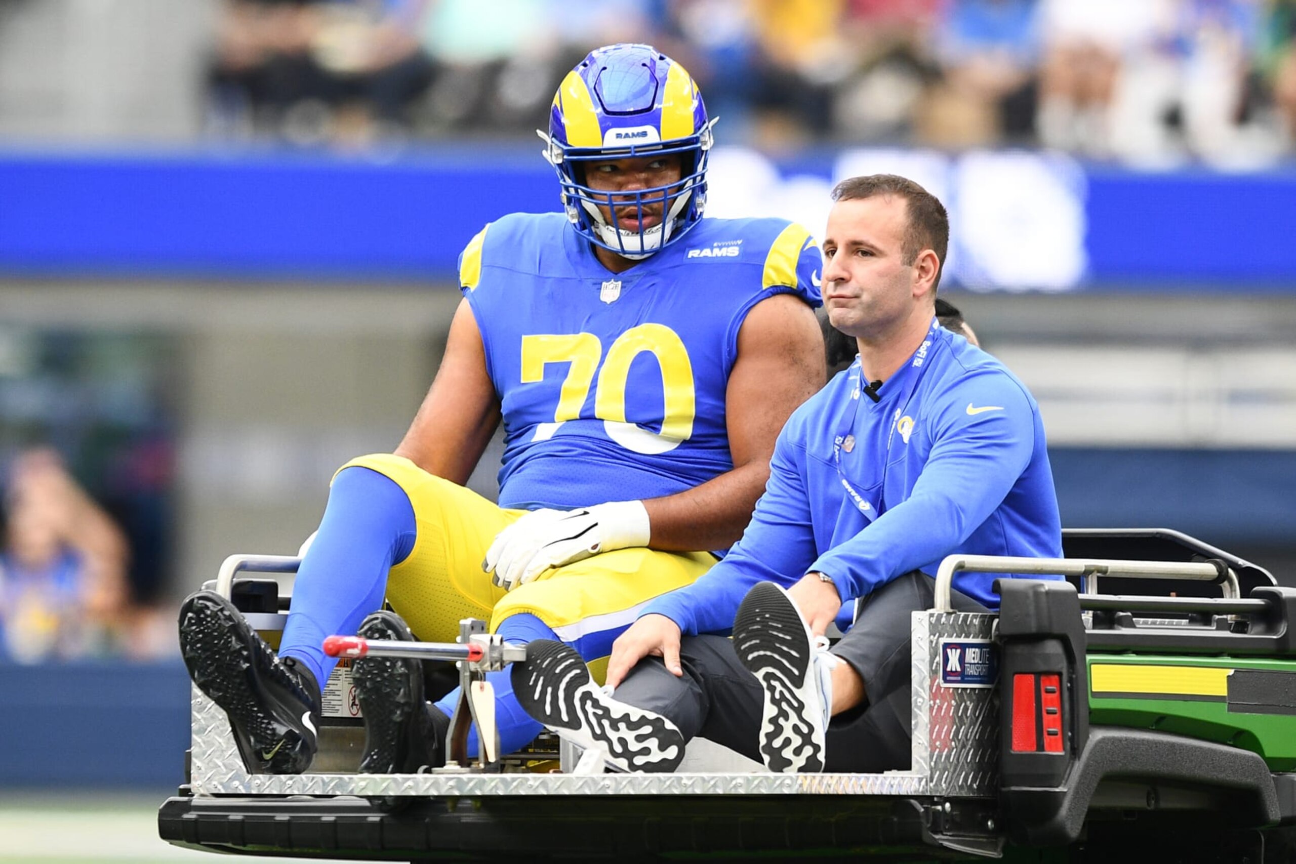 INGLEWOOD, CA - OCTOBER 16: Los Angeles Rams Offensive Tackle Joe Noteboom (70) is carted off the field after being injured during the NFL game between the Carolina Panthers and the Los Angeles Rams on October 16, 2022, at SoFi Stadium in Inglewood, CA. (Photo by Brian Rothmuller/Icon Sportswire via Getty Images)