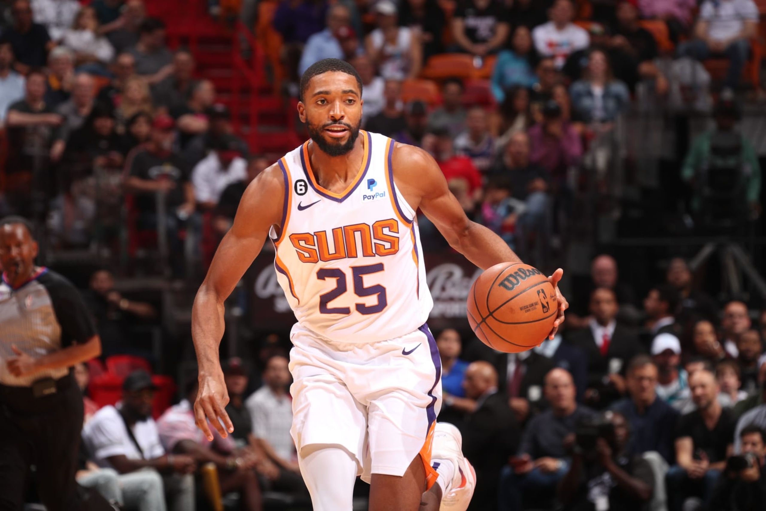 MIAMI, FL - NOVEMBER 14: Mikal Bridges #25 of the Phoenix Suns dribbles the ball during the game against the Miami Heat on November 14, 2022 at FTX Arena in Miami, Florida. NOTE TO USER: User expressly acknowledges and agrees that, by downloading and or using this Photograph, user is consenting to the terms and conditions of the Getty Images License Agreement. Mandatory Copyright Notice: Copyright 2022 NBAE (Photo by Issac Baldizon/NBAE via Getty Images)