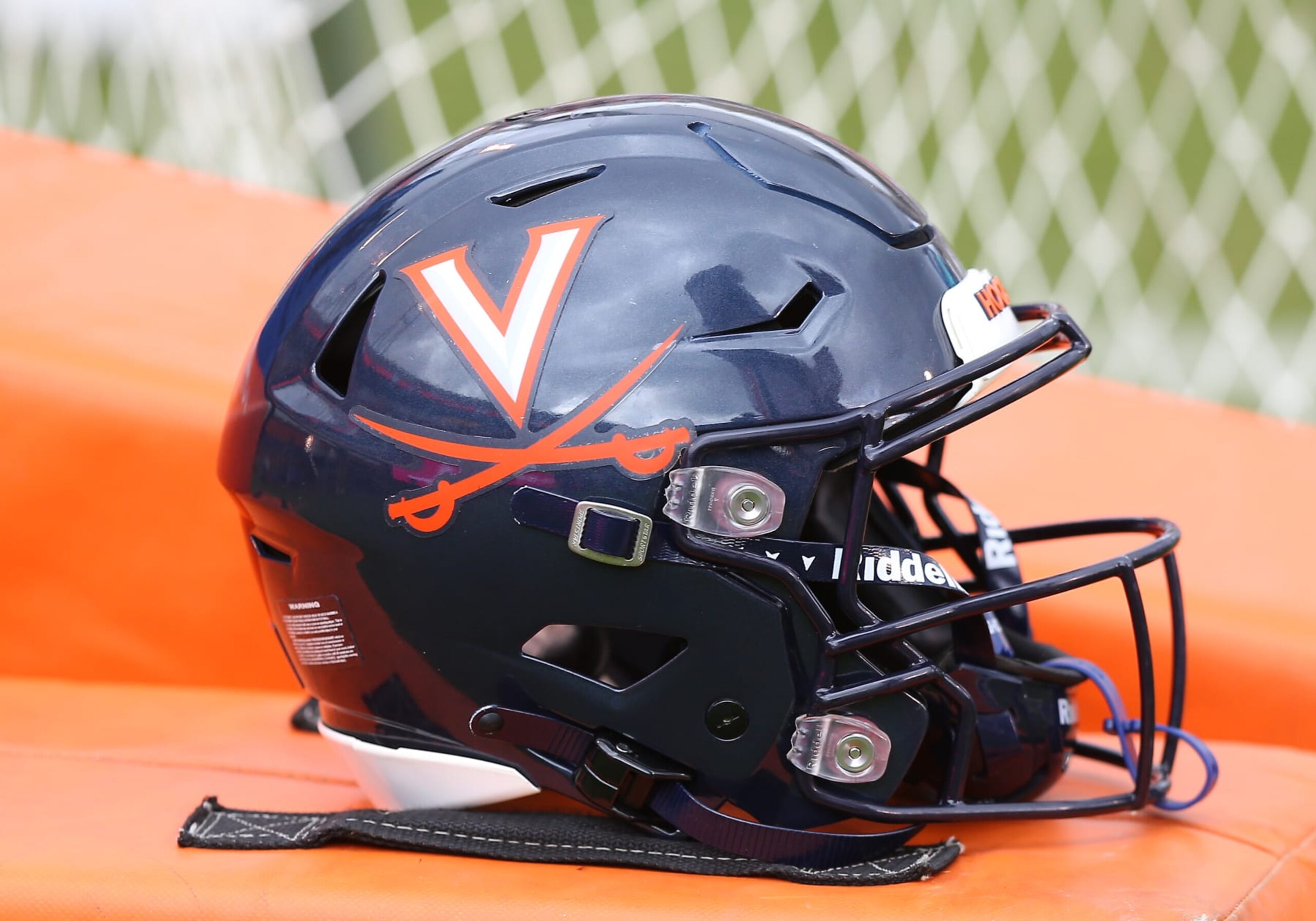 CHARLOTTESVILLE, VA - NOVEMBER 05: Virginia Cavaliers helmet with logo resting on the sidelines during a college football game between the North Carolina Tar Heels and the Virginia Cavaliers on November 05, 2022, at Scott Stadium in Charlottesville, VA. (Photo by Lee Coleman/Icon Sportswire via Getty Images) CHARLOTTESVILLE, VA - NOVEMBER 05: Virginia Cavaliers helmet with logo resting on the sidelines during a college football game between the North Carolina Tar Heels and the Virginia Cavaliers on November 05, 2022, at Scott Stadium in Charlottesville, VA. (Photo by Lee Coleman/Icon Sportswire via Getty Images)