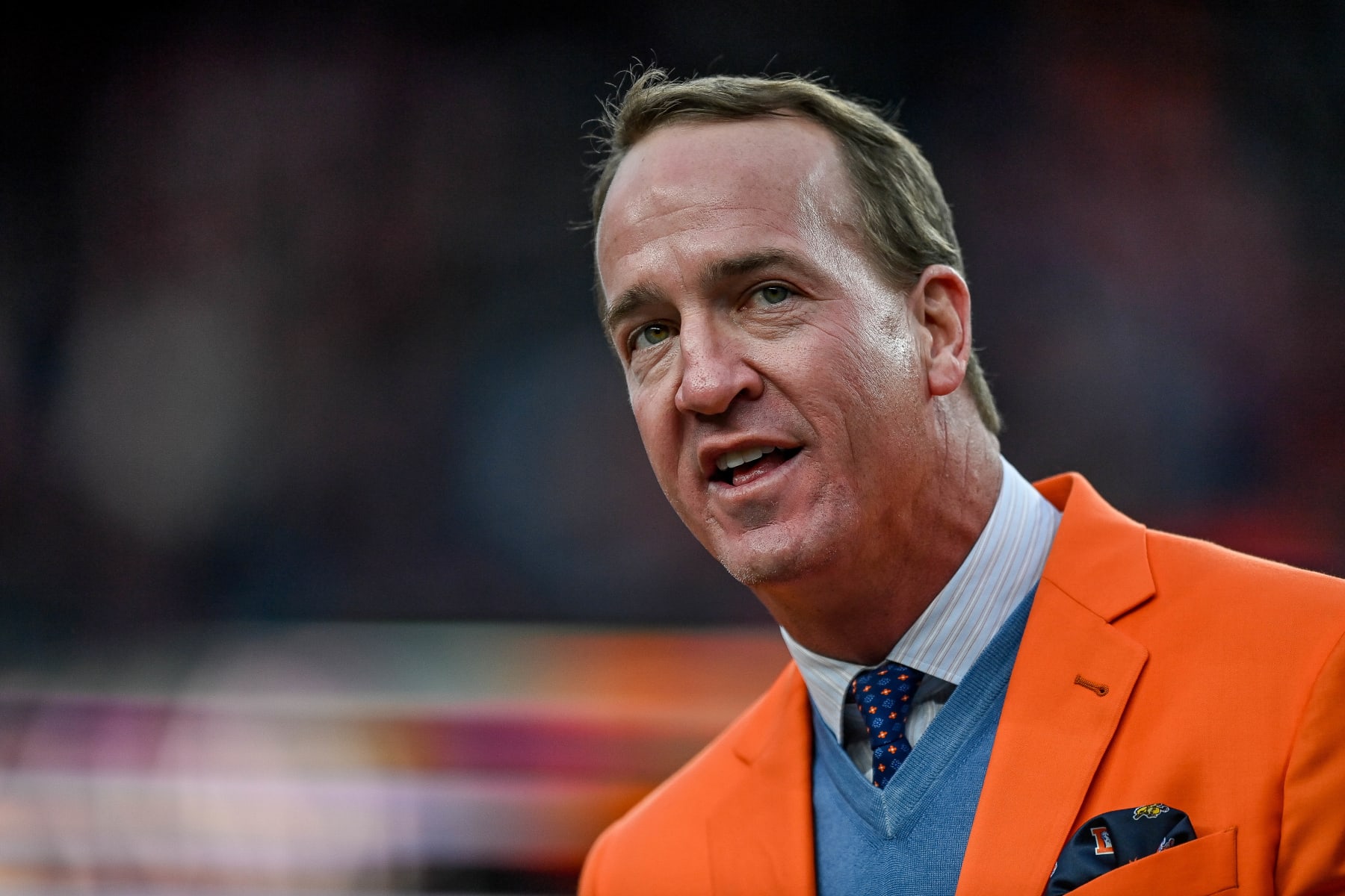 DENVER, CO - OCTOBER 31: Former Denver Broncos quarterback Peyton Manning speaks during a ceremony to reveal his name on the stadium Ring of Fame at halftime during a game between the Denver Broncos and the Washington Football Team at Empower Field at Mile High on October 31, 2021 in Denver, Colorado. (Photo by Dustin Bradford/Icon Sportswire via Getty Images)