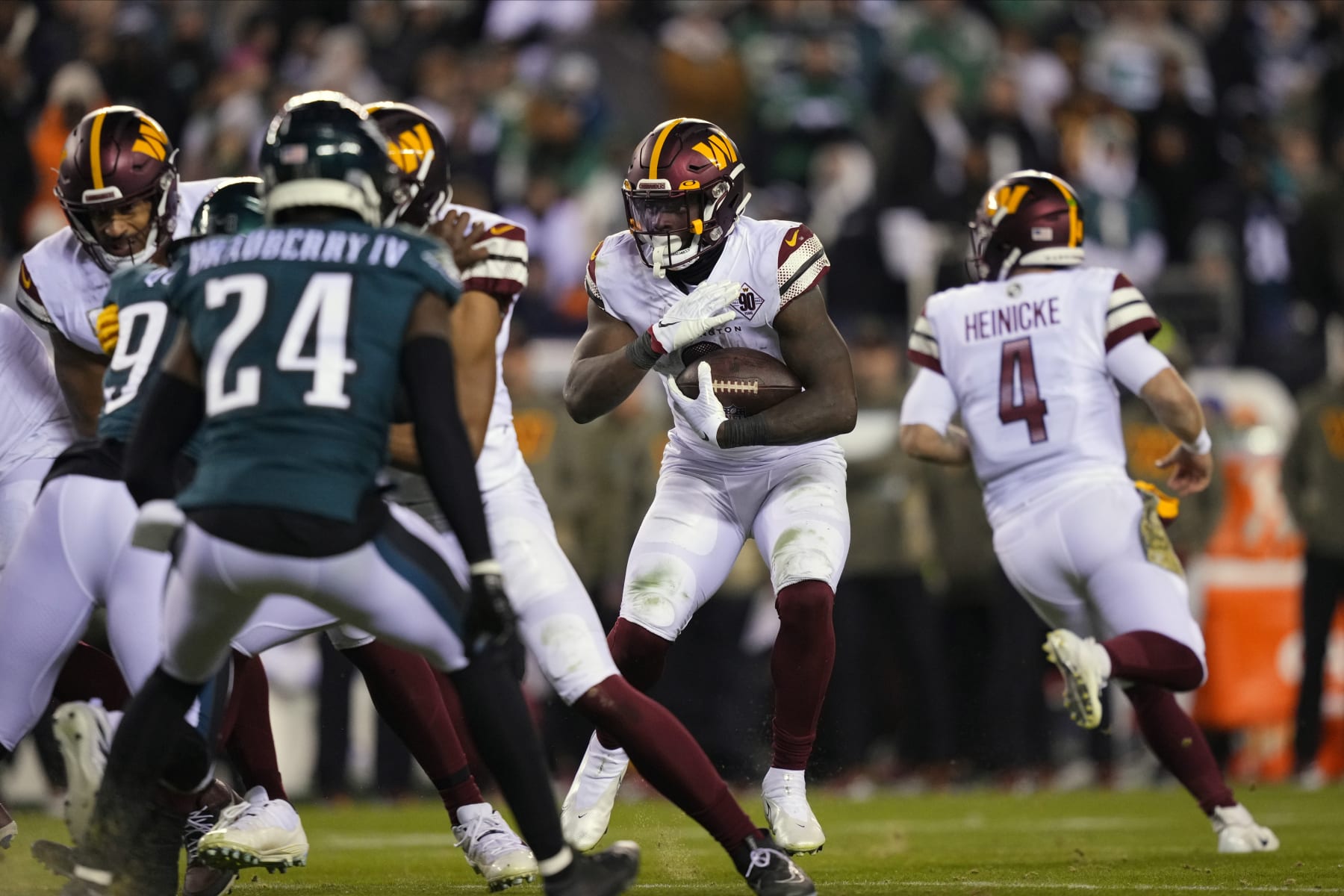 Washington Commanders running back Brian Robinson Jr. (8) runs the ball during the second half of an NFL football game against the Philadelphia Eagles, Monday, Nov. 14, 2022, in Philadelphia. (AP Photo/Matt Slocum)