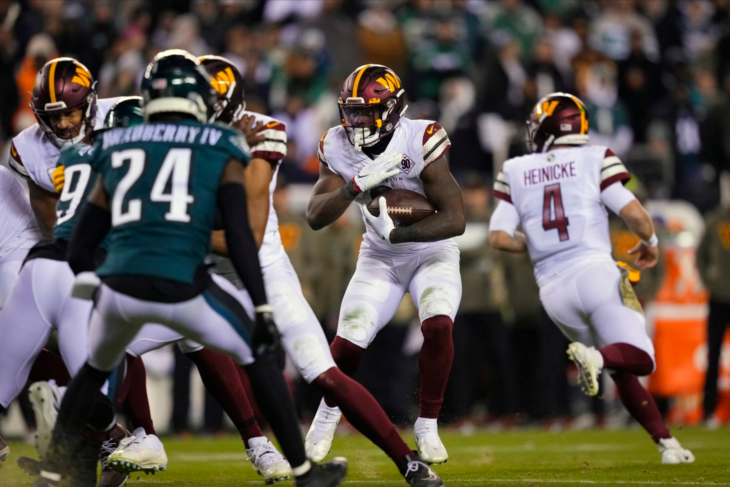 Washington Commanders running back Brian Robinson Jr. (8) runs the ball during the second half of an NFL football game against the Philadelphia Eagles, Monday, Nov. 14, 2022, in Philadelphia. (AP Photo/Matt Slocum)