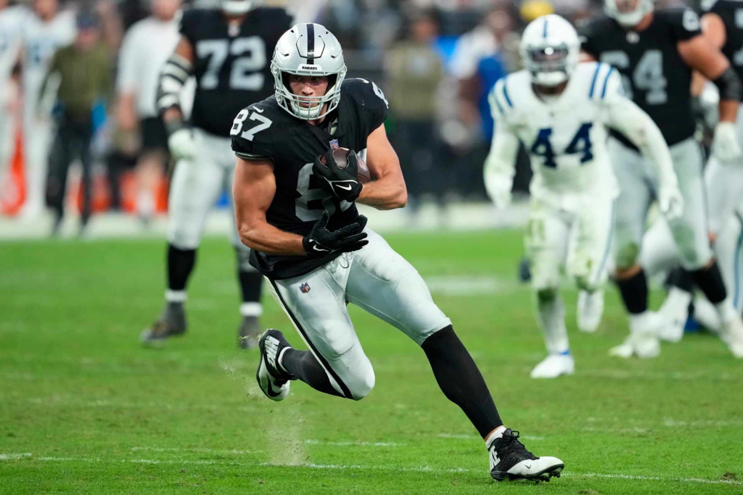 Las Vegas Raiders tight end Foster Moreau (87) runs the ball against the Indianapolis Colts during an NFL football game, Sunday, Nov. 13, 2022, in Las Vegas. (AP Photo/Matt York) Las Vegas Raiders tight end Foster Moreau (87) runs the ball against the Indianapolis Colts during an NFL football game, Sunday, Nov. 13, 2022, in Las Vegas. (AP Photo/Matt York)