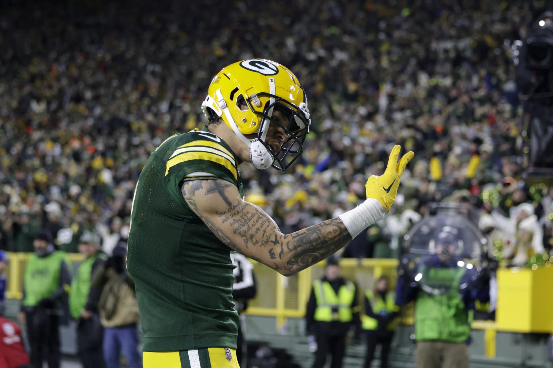 Green Bay Packers wide receiver Christian Watson (9) celebrates catching a touchdown pass during the second half of an NFL football game against the Dallas Cowboys Sunday, Nov. 13, 2022, in Green Bay, Wis. (AP Photo/Matt Ludtke)