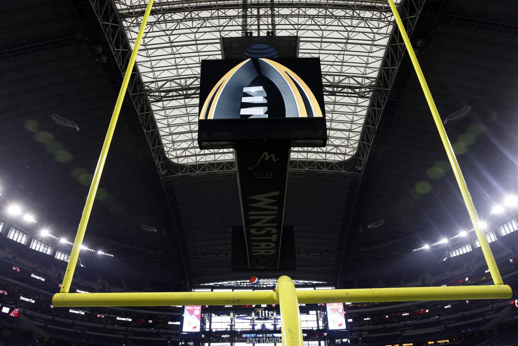 The CFP logo is displayed before the Cotton Bowl NCAA College Football Playoff semifinal game, Friday, Dec. 31, 2021, in Arlington, Texas. (AP Photo/Michael Ainsworth)