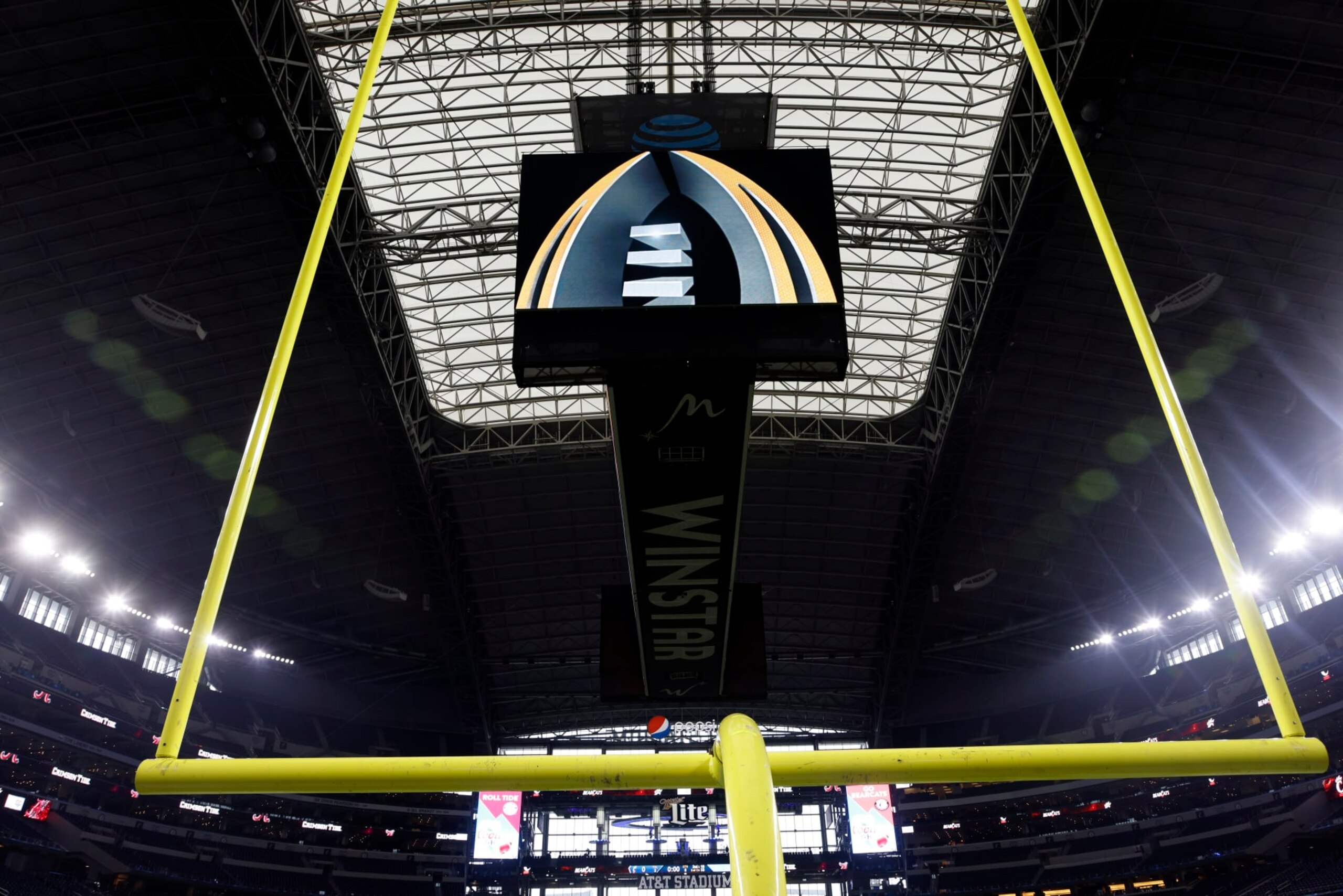 The CFP logo is displayed before the Cotton Bowl NCAA College Football Playoff semifinal game, Friday, Dec. 31, 2021, in Arlington, Texas. (AP Photo/Michael Ainsworth)
