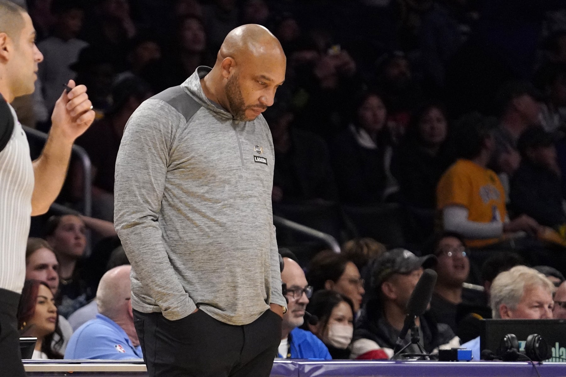 Los Angeles Lakers head coach Darvin Ham looks down at the ground in the closing seconds in the second half of an NBA basketball game against the Sacramento Kings Friday, Nov. 11, 2022, in Los Angeles. (AP Photo/Mark J. Terrill)