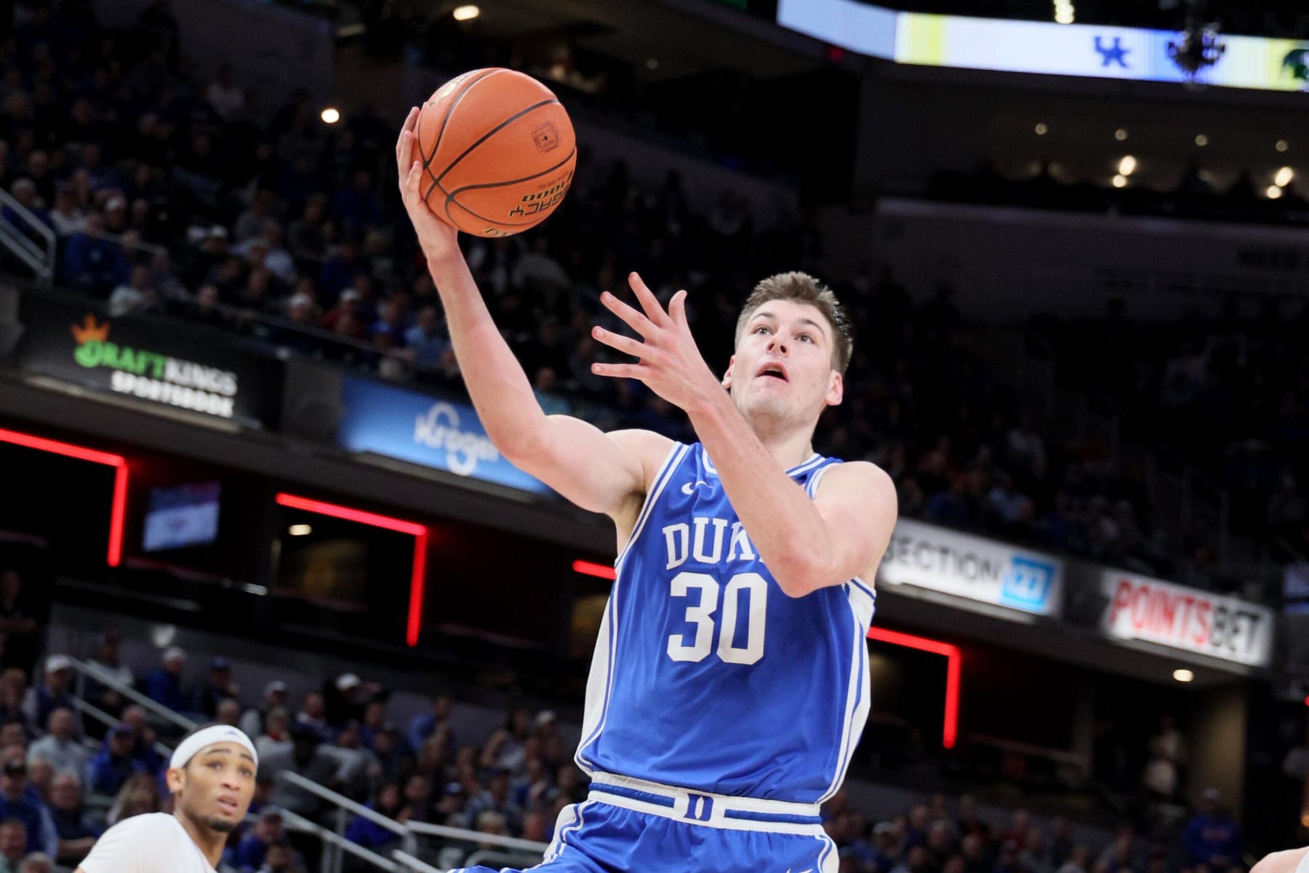 INDIANAPOLIS, INDIANA - NOVEMBER 15: Kyle Filipowski #30 of the Duke Blue Devils takes a shot during the second half in the game against the Kansas Jayhawks during the Champions Classic at Gainbridge Fieldhouse on November 15, 2022 in Indianapolis, Indiana. (Photo by Andy Lyons/Getty Images) INDIANAPOLIS, INDIANA - NOVEMBER 15: Kyle Filipowski #30 of the Duke Blue Devils takes a shot during the second half in the game against the Kansas Jayhawks during the Champions Classic at Gainbridge Fieldhouse on November 15, 2022 in Indianapolis, Indiana. (Photo by Andy Lyons/Getty Images)