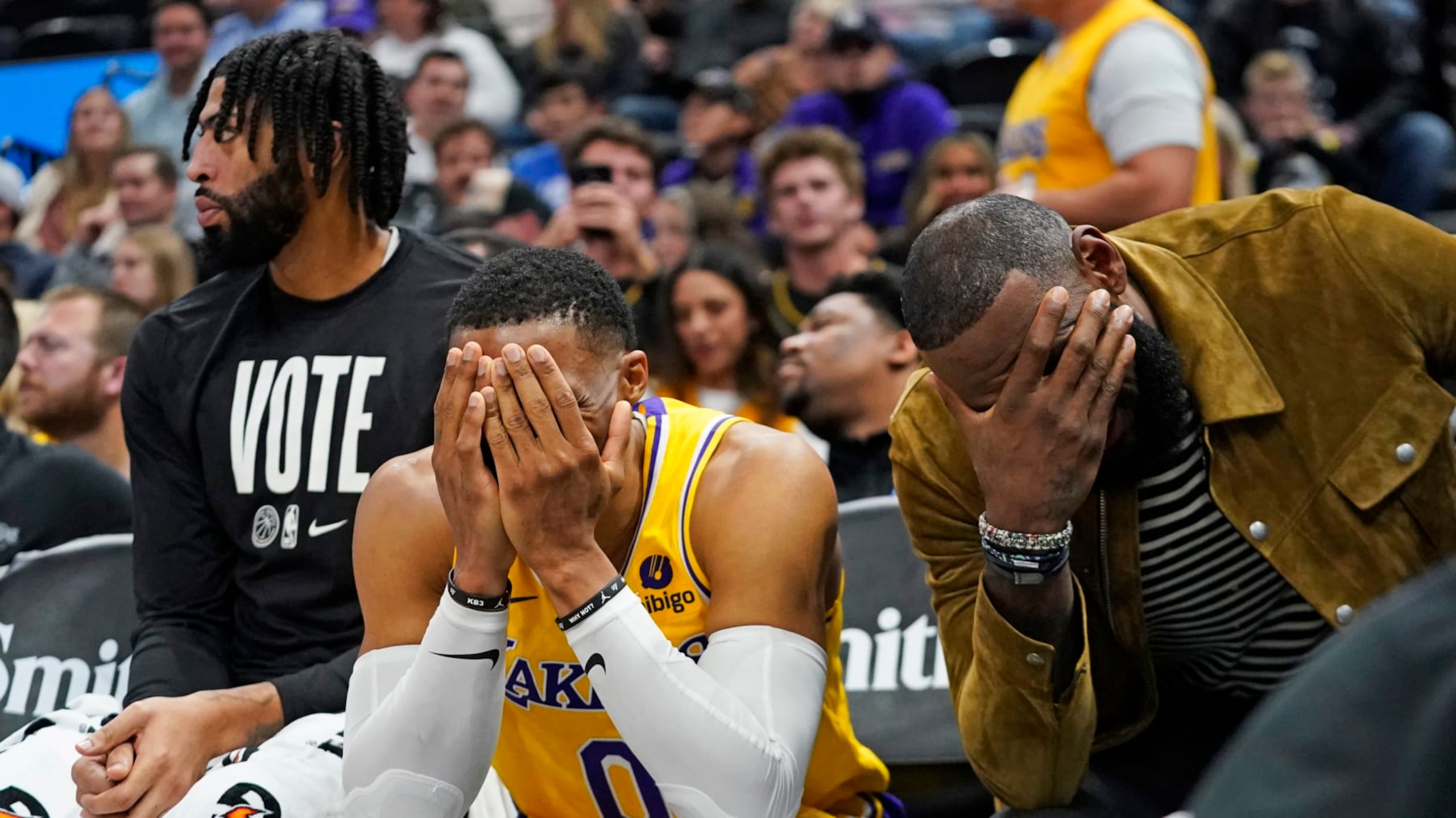 Los Angeles Lakers' Anthony Davis, left, Russell Westbrook (0) and LeBron James sit on the bench near the end of the fourth quarter of the team's NBA basketball game against the Utah Jazz on Monday, Nov. 7, 2022, in Salt Lake City. (AP Photo/Rick Bowmer) Los Angeles Lakers' Anthony Davis, left, Russell Westbrook (0) and LeBron James sit on the bench near the end of the fourth quarter of the team's NBA basketball game against the Utah Jazz on Monday, Nov. 7, 2022, in Salt Lake City. (AP Photo/Rick Bowmer)