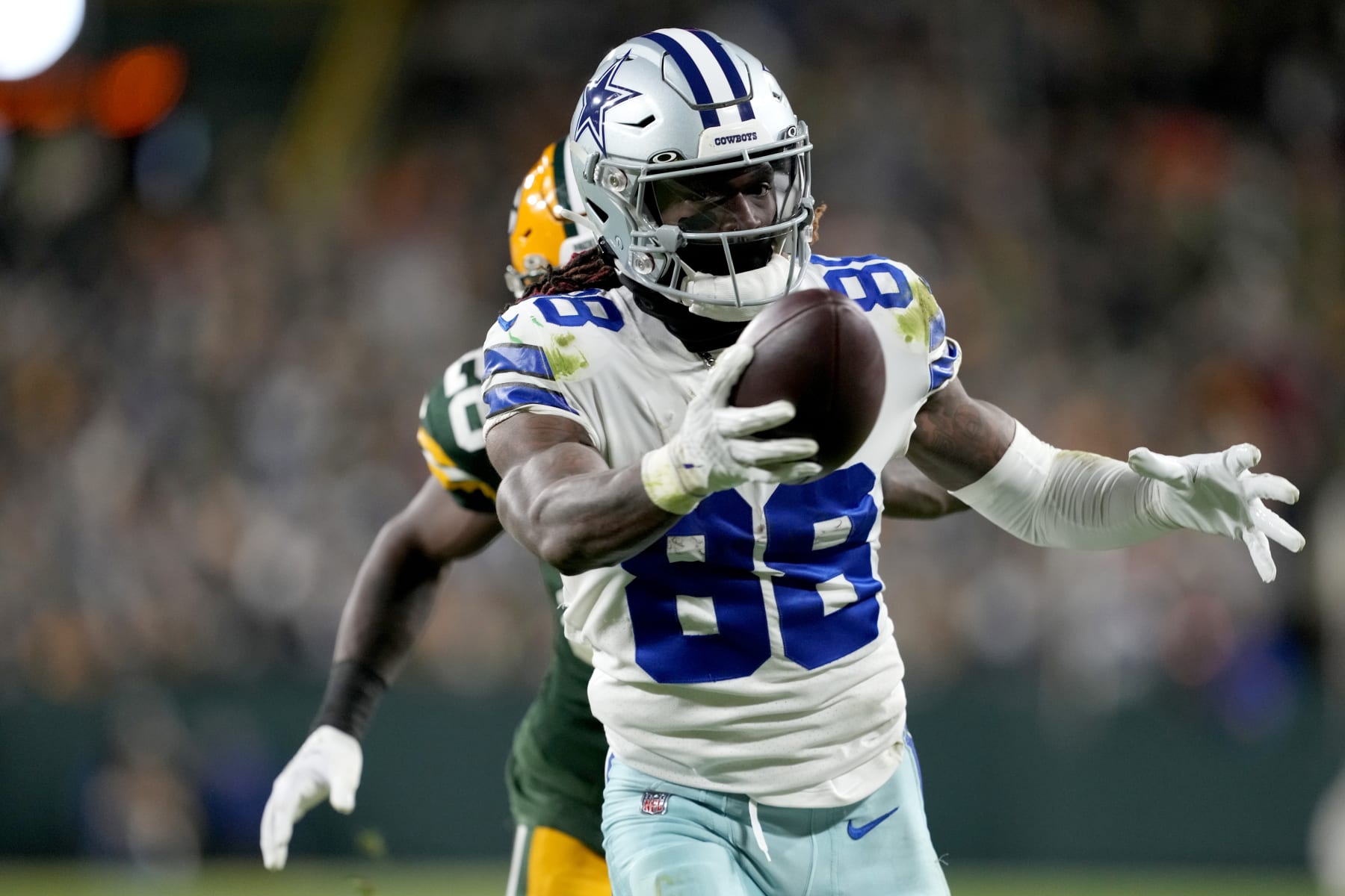 GREEN BAY, WISCONSIN - NOVEMBER 13: CeeDee Lamb #88 of the Dallas Cowboys scores a touchdown during the third quarter against the Green Bay Packers at Lambeau Field on November 13, 2022 in Green Bay, Wisconsin. (Photo by Patrick McDermott/Getty Images)
