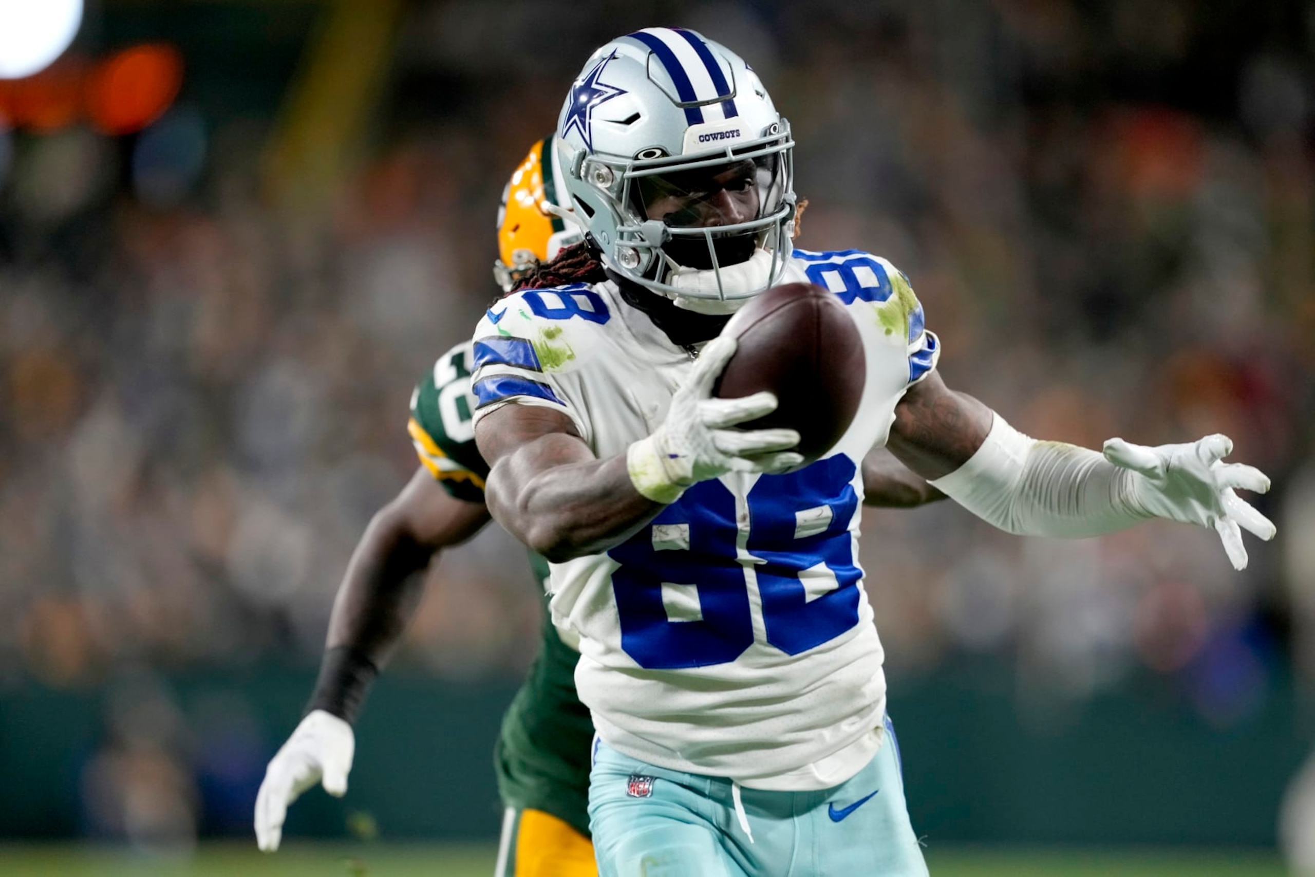 GREEN BAY, WISCONSIN - NOVEMBER 13: CeeDee Lamb #88 of the Dallas Cowboys scores a touchdown during the third quarter against the Green Bay Packers at Lambeau Field on November 13, 2022 in Green Bay, Wisconsin. (Photo by Patrick McDermott/Getty Images) GREEN BAY, WISCONSIN - NOVEMBER 13: CeeDee Lamb #88 of the Dallas Cowboys scores a touchdown during the third quarter against the Green Bay Packers at Lambeau Field on November 13, 2022 in Green Bay, Wisconsin. (Photo by Patrick McDermott/Getty Images)