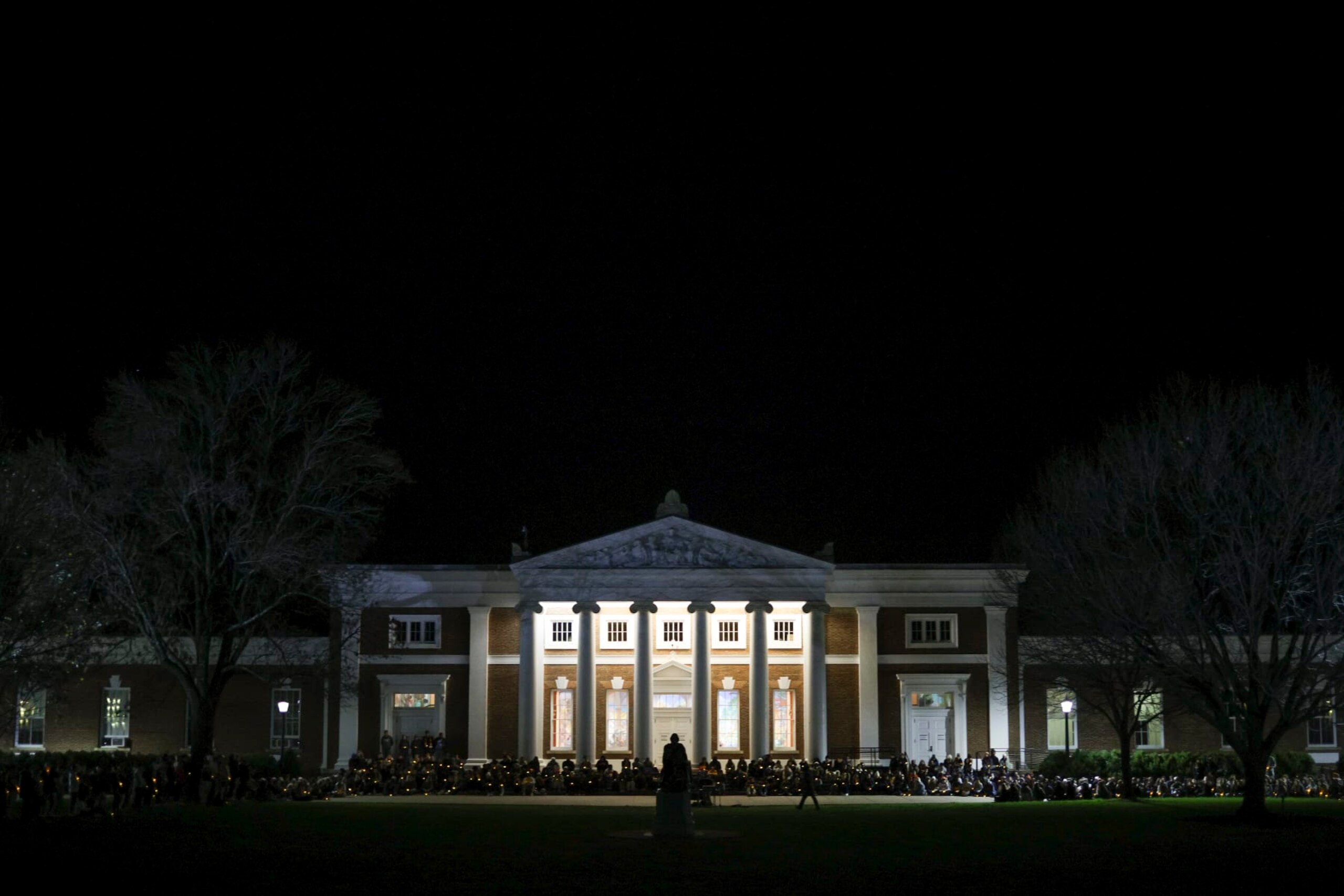 CHARLOTTESVILLE, VIRGINIA - NOVEMBER 14: Members of the University of Virginia community attend a candlelight vigil on the South Lawn for the victims of a shooting overnight at the university, on November 14, 2022 in Charlottesville, Virginia. Christopher Darnell Jones Jr. was apprehended this morning in connection with the shooting in which three university football players were killed and two others wounded. (Photo by Win McNamee/Getty Images) CHARLOTTESVILLE, VIRGINIA - NOVEMBER 14: Members of the University of Virginia community attend a candlelight vigil on the South Lawn for the victims of a shooting overnight at the university, on November 14, 2022 in Charlottesville, Virginia. Christopher Darnell Jones Jr. was apprehended this morning in connection with the shooting in which three university football players were killed and two others wounded. (Photo by Win McNamee/Getty Images)